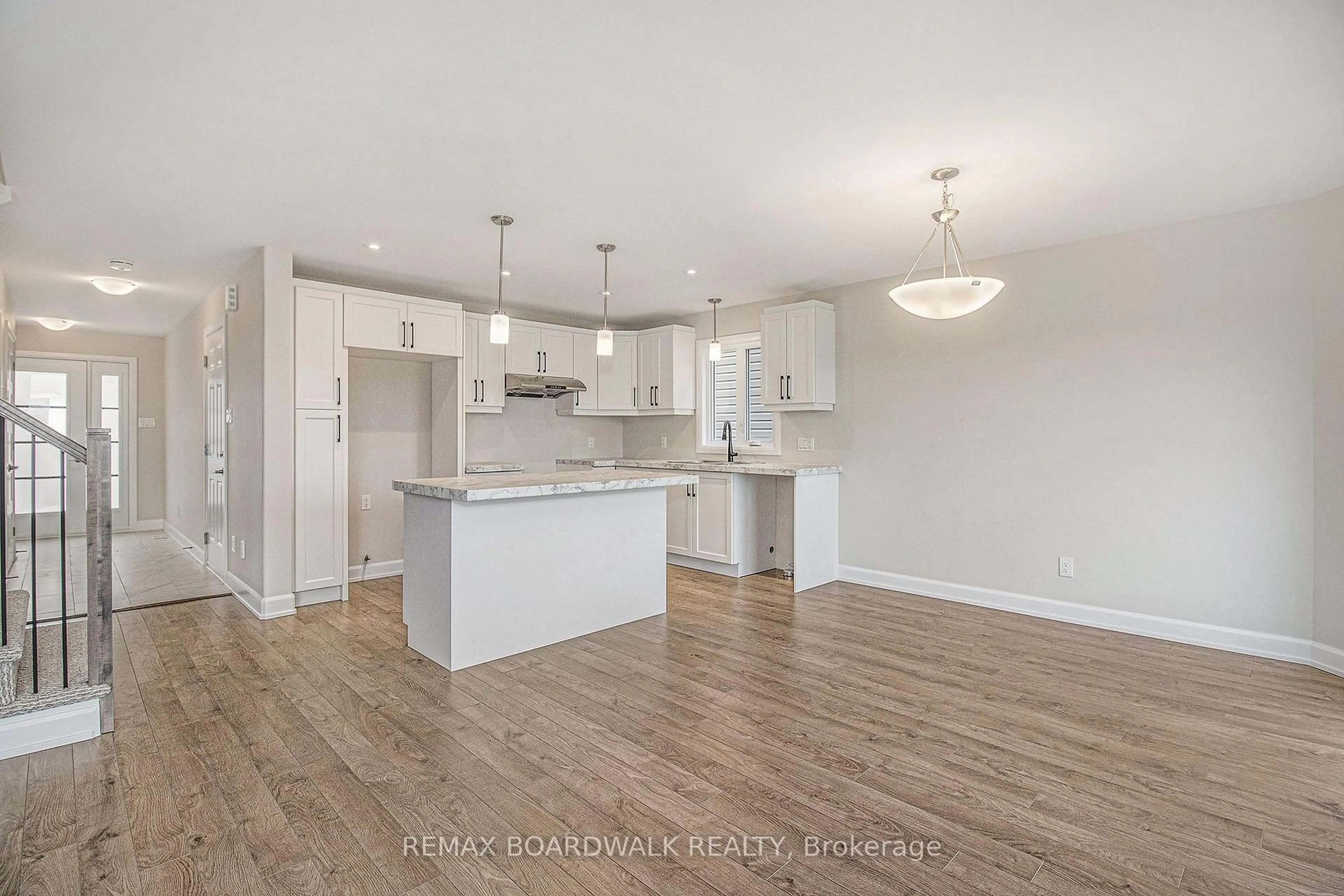 Open concept kitchen, wood/laminate floor for 1207 MONTBLANC Cres, Russell Ontario K0A 1W0