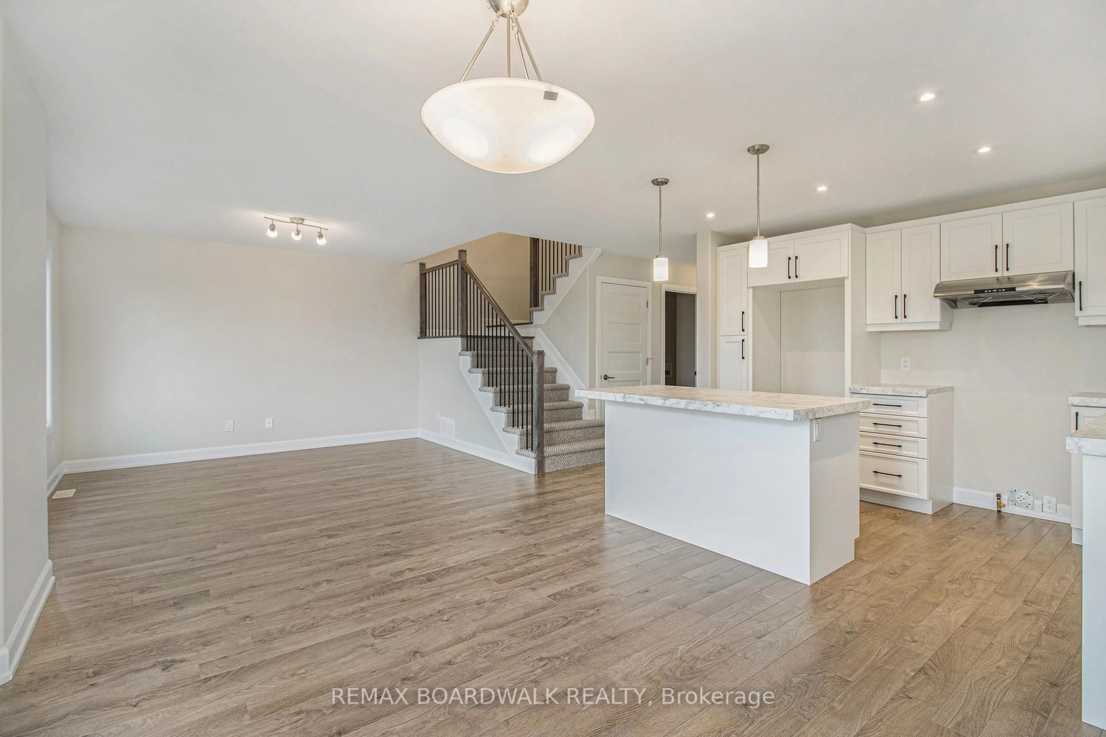 Open concept kitchen, wood/laminate floor for 1207 MONTBLANC Cres, Russell Ontario K0A 1W0
