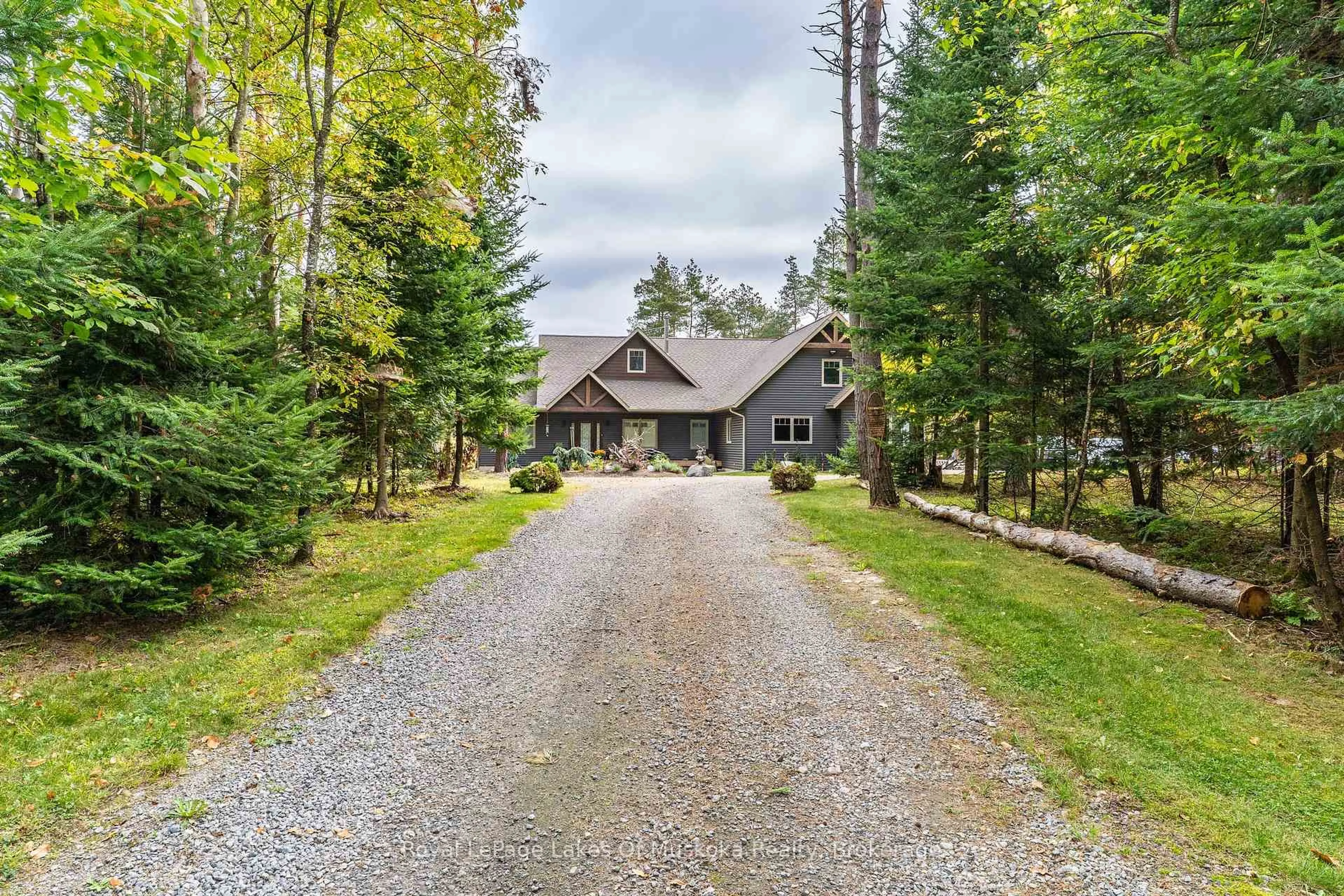 A pic from outside/outdoor area/front of a property/back of a property/a pic from drone, unknown for 461 Rowanwood Rd, Huntsville Ontario P0B 1M0