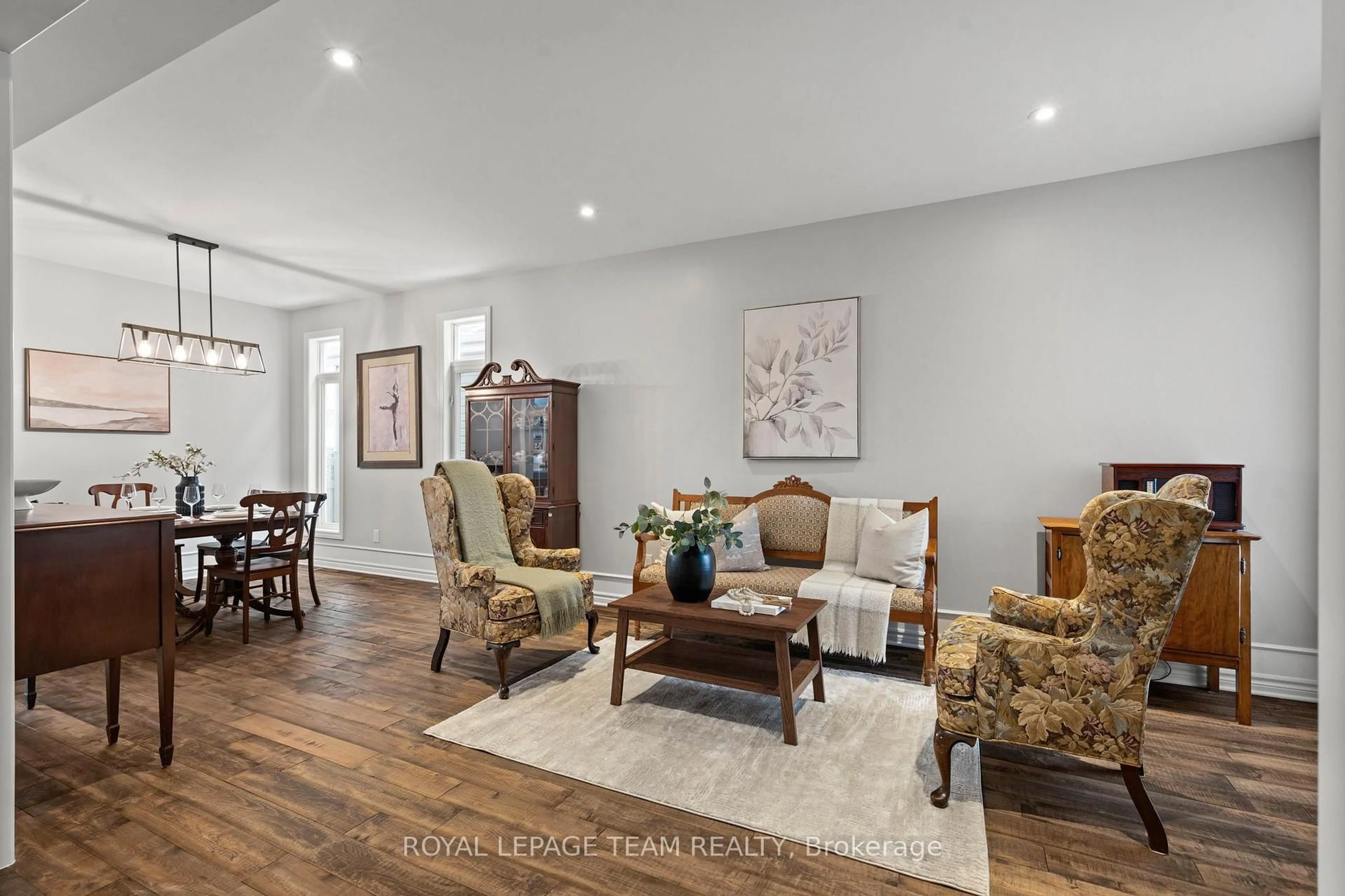 Living room with furniture, wood/laminate floor for 337 Sugar Pine Cres, Kanata Ontario K2M 0H6