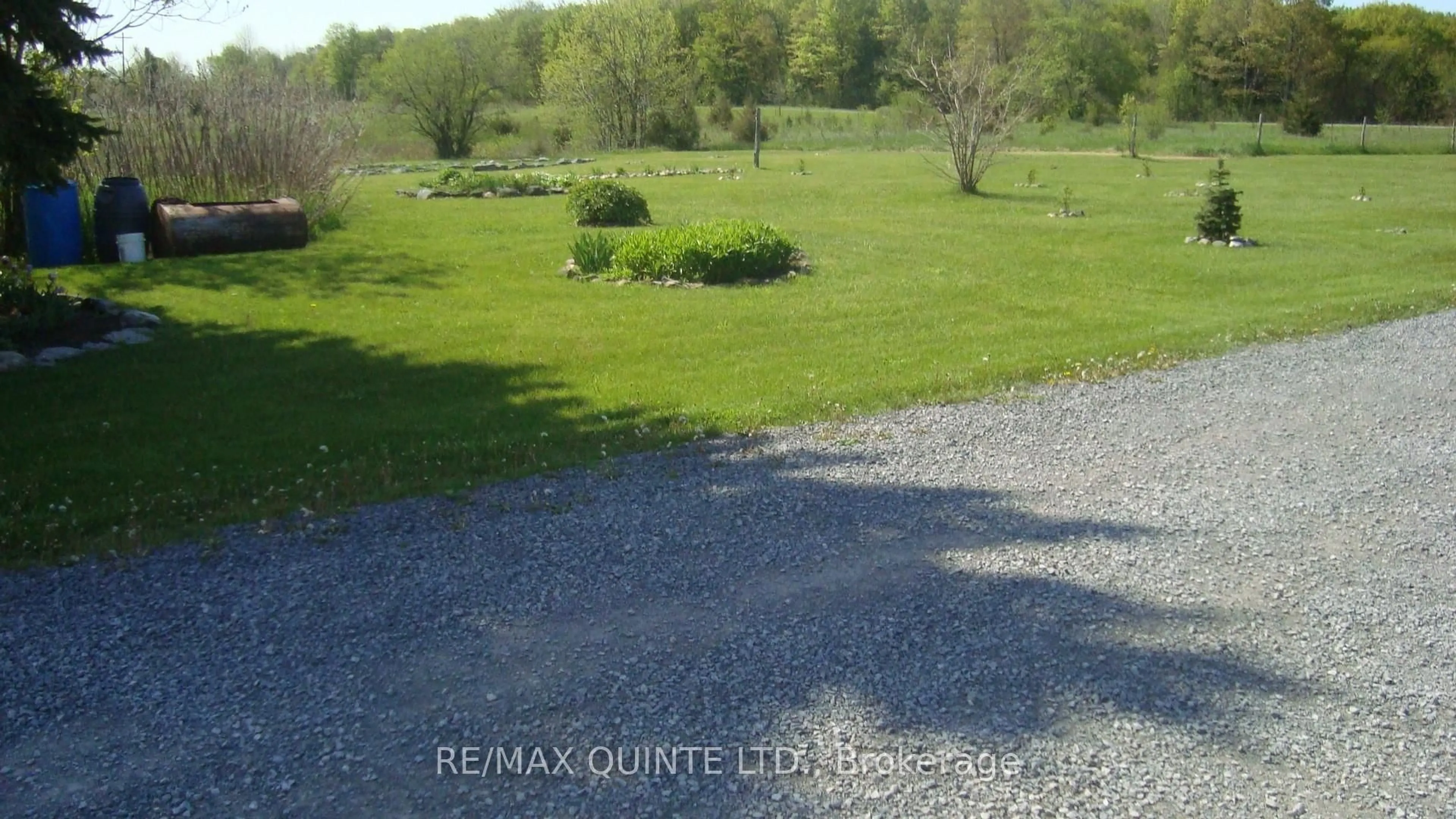 A pic from outside/outdoor area/front of a property/back of a property/a pic from drone, water/lake/river/ocean view for 159 Simpson Rd, Prince Edward County Ontario K0K 1P0
