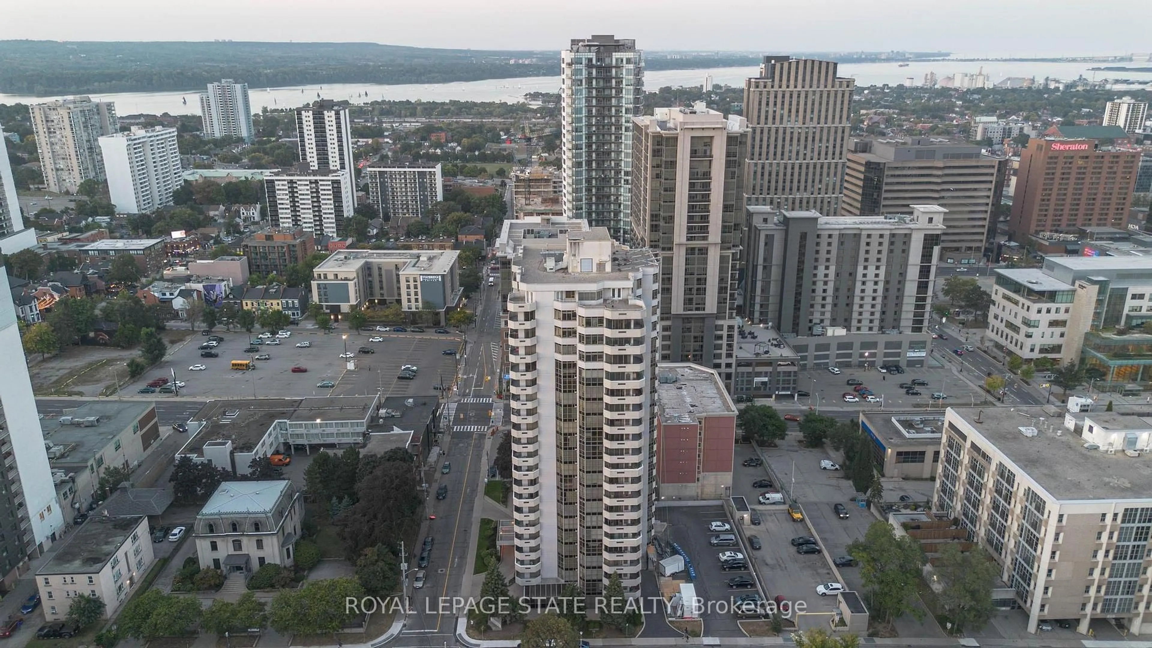 A pic from outside/outdoor area/front of a property/back of a property/a pic from drone, city buildings view from balcony for 67 Caroline St #17C, Hamilton Ontario L8P 3K6
