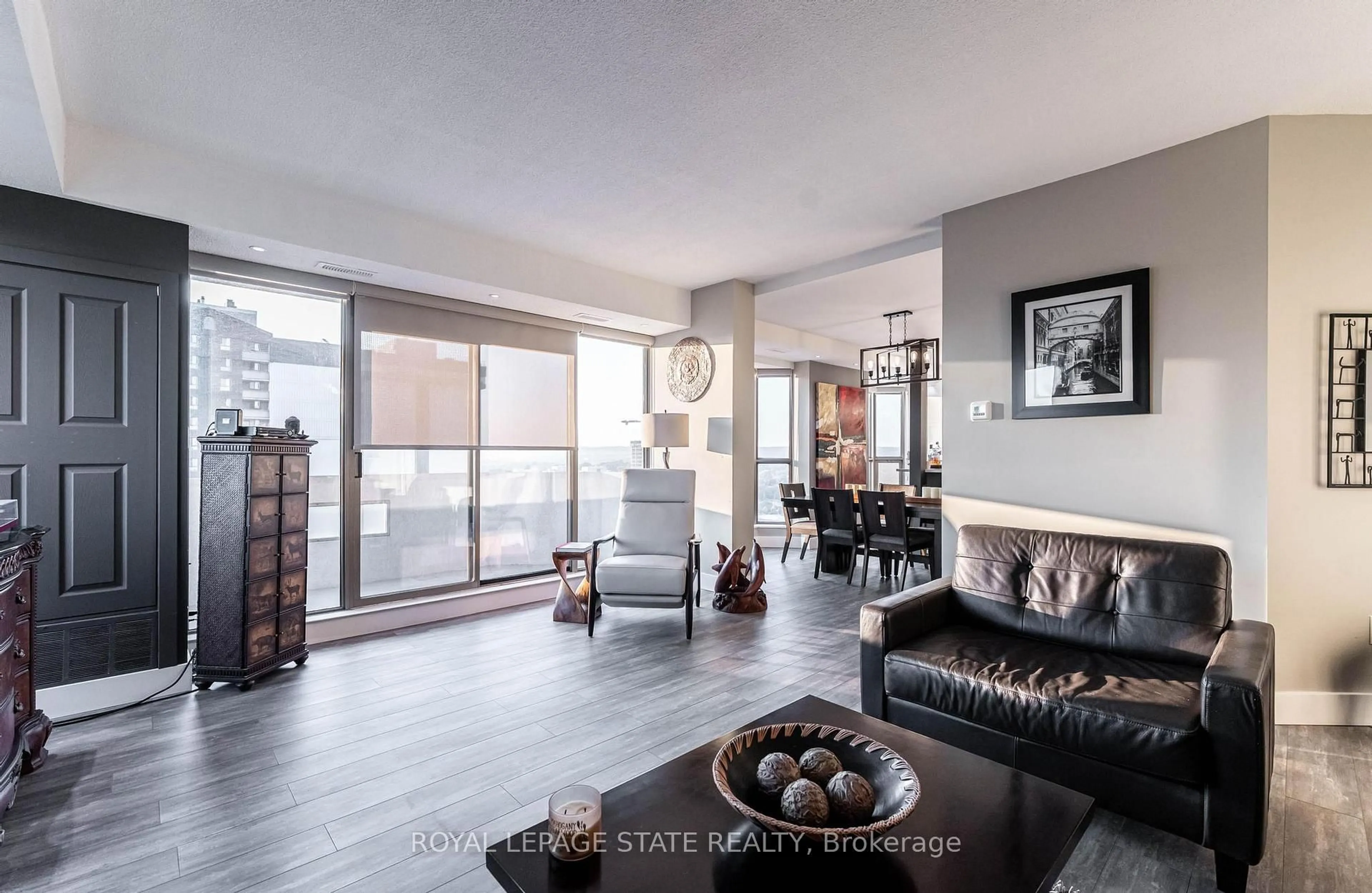 Living room with furniture, unknown for 67 Caroline St #17C, Hamilton Ontario L8P 3K6