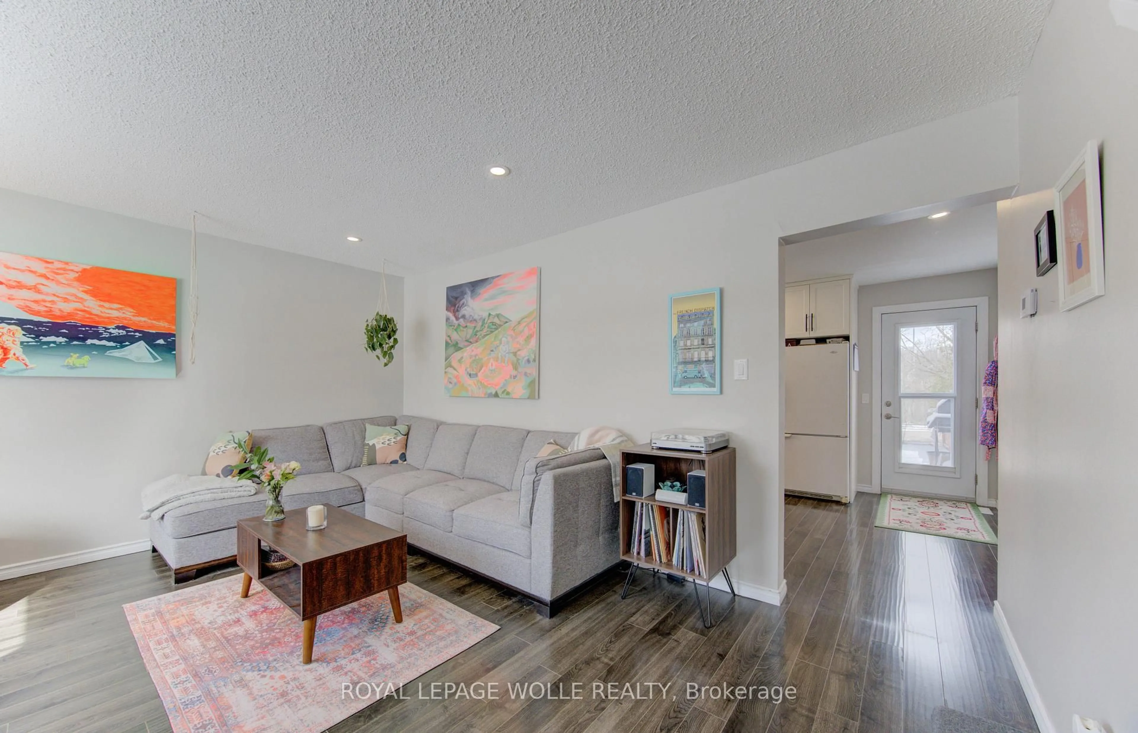 Living room with furniture, wood/laminate floor for 110 Lillian Dr #A, Waterloo Ontario N2J 4J9