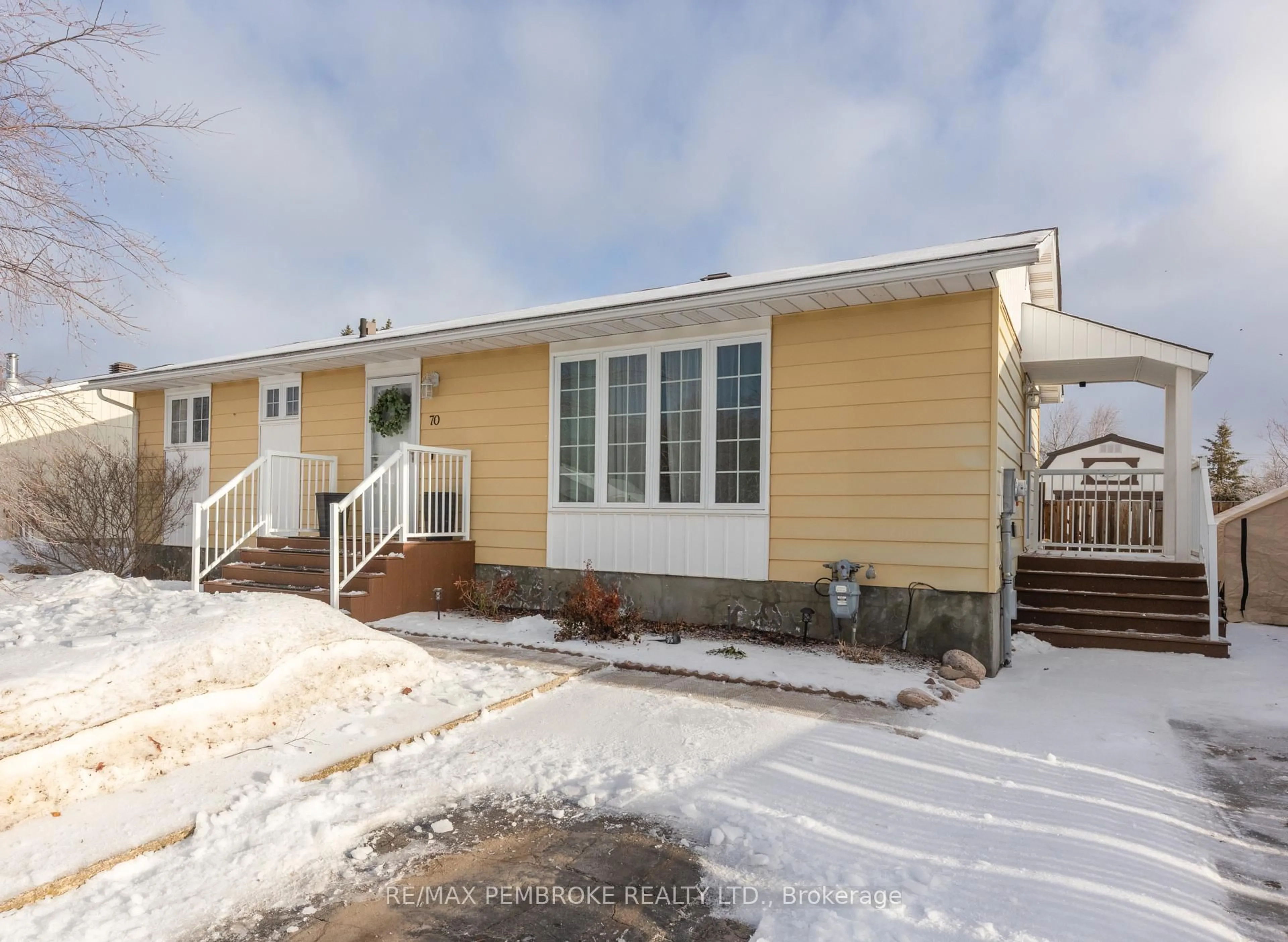 Home with vinyl exterior material, street for 70 Herman St, Petawawa Ontario K8H 1W2