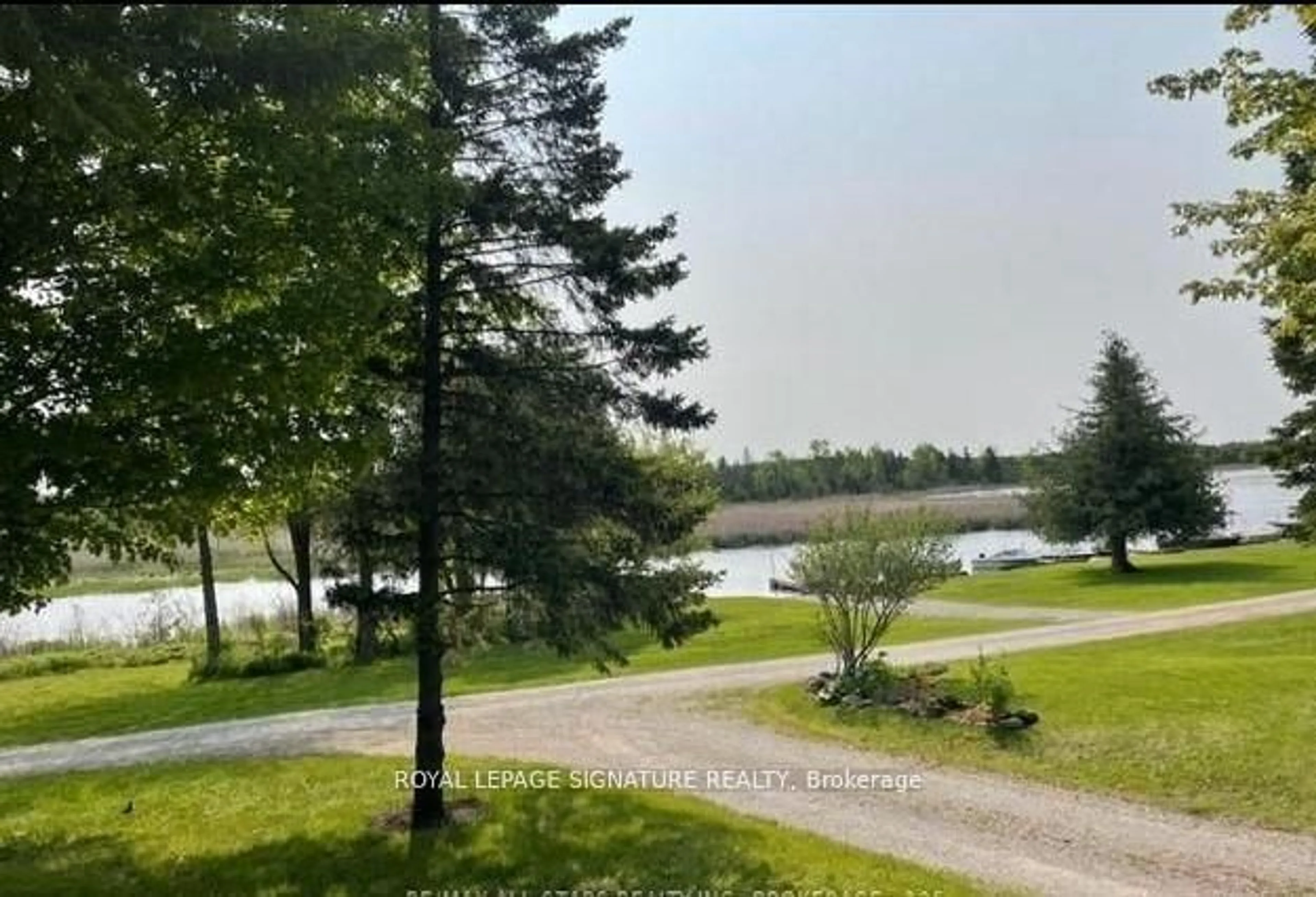 A pic from outside/outdoor area/front of a property/back of a property/a pic from drone, water/lake/river/ocean view for 2152 County 36 Rd #30, Kawartha Lakes Ontario K0M 1L0
