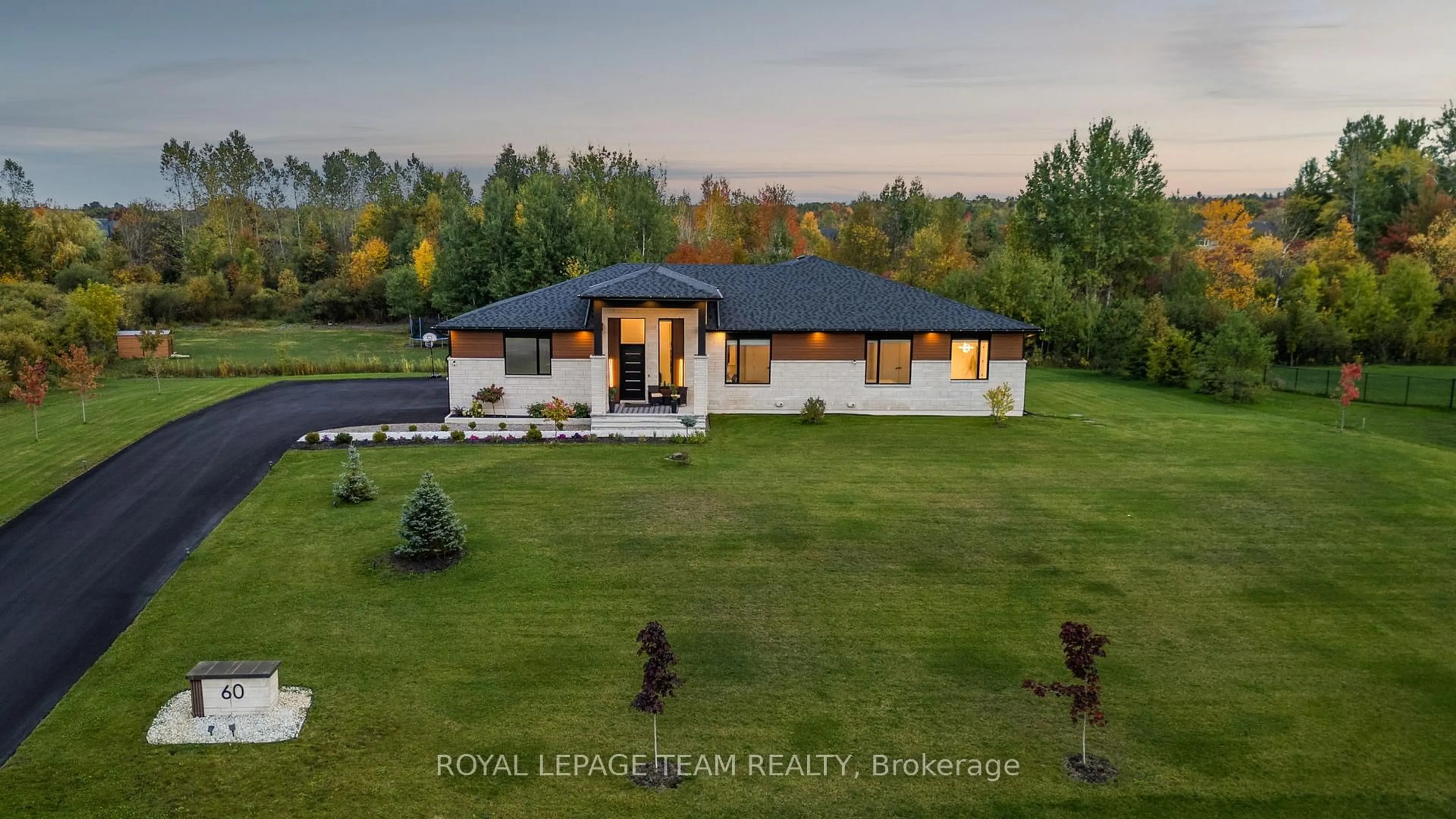 A pic from outside/outdoor area/front of a property/back of a property/a pic from drone, unknown for 60 Synergy Way, Ottawa Ontario K2W 0K3