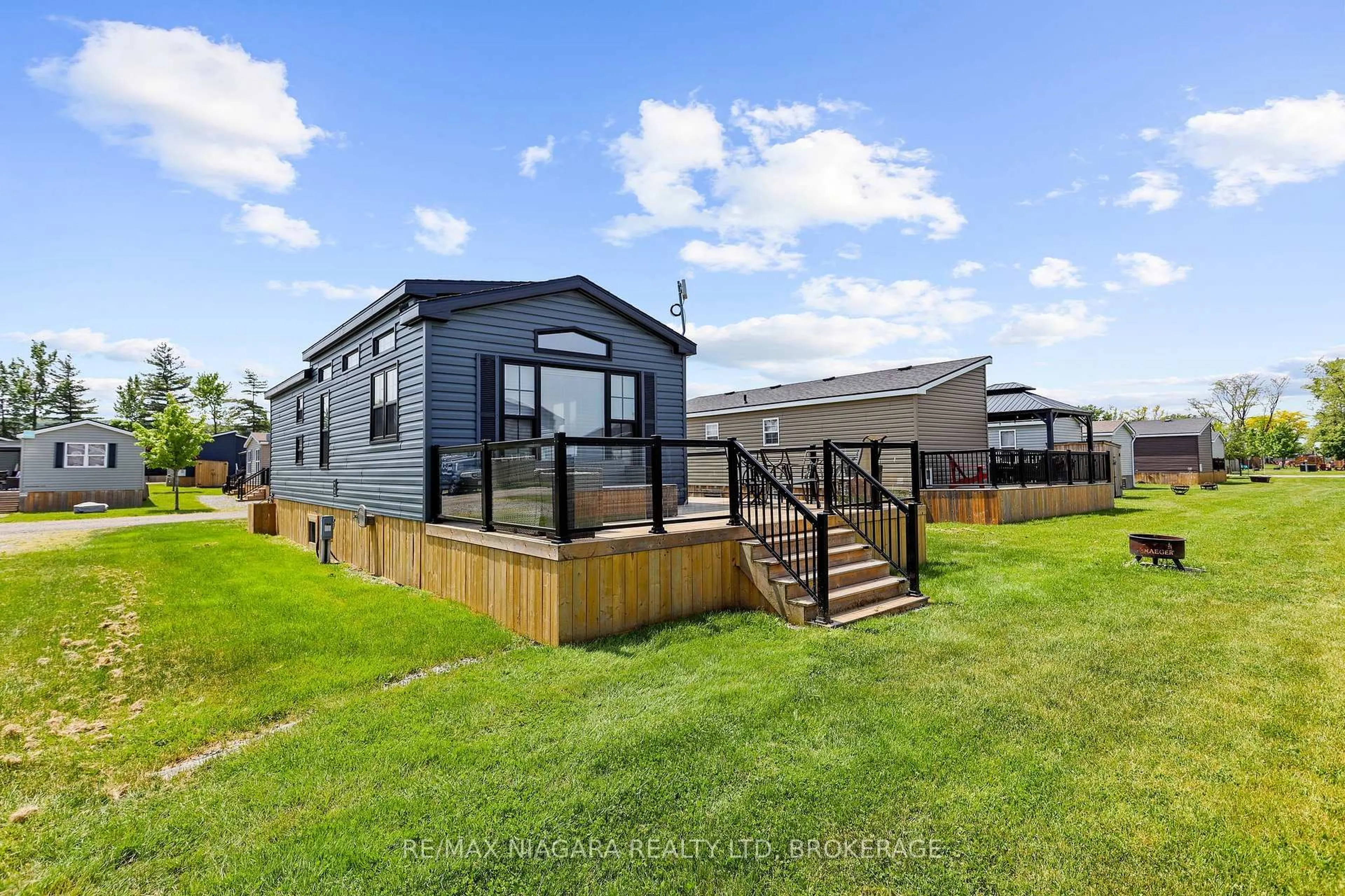 A pic from outside/outdoor area/front of a property/back of a property/a pic from drone, water/lake/river/ocean view for 1501 LINE 8 Rd #210, Niagara-on-the-Lake Ontario L0S 1L0