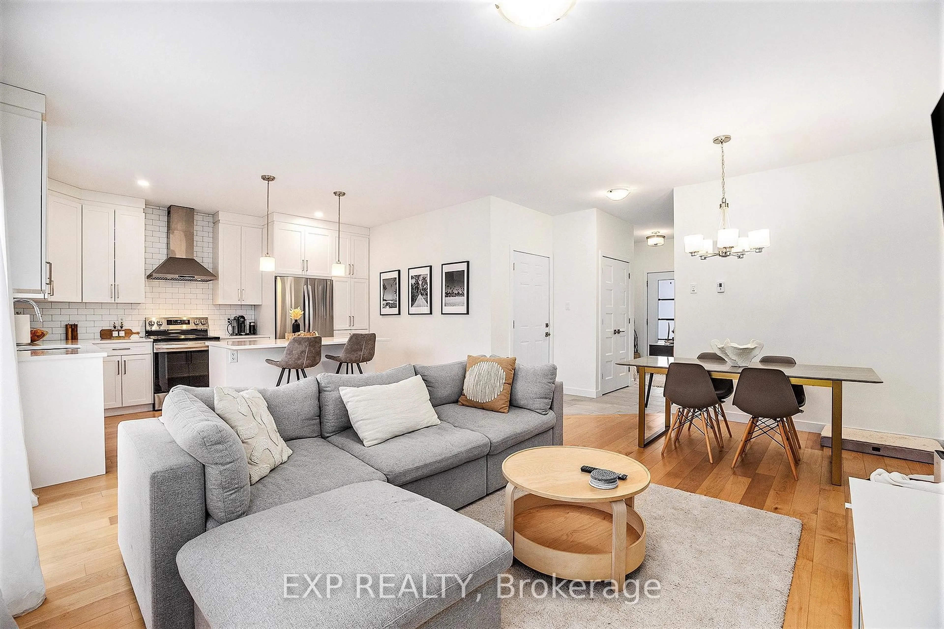 Living room with furniture, wood/laminate floor for 12 LIVYA St, The Nation Ontario K0A 2M0