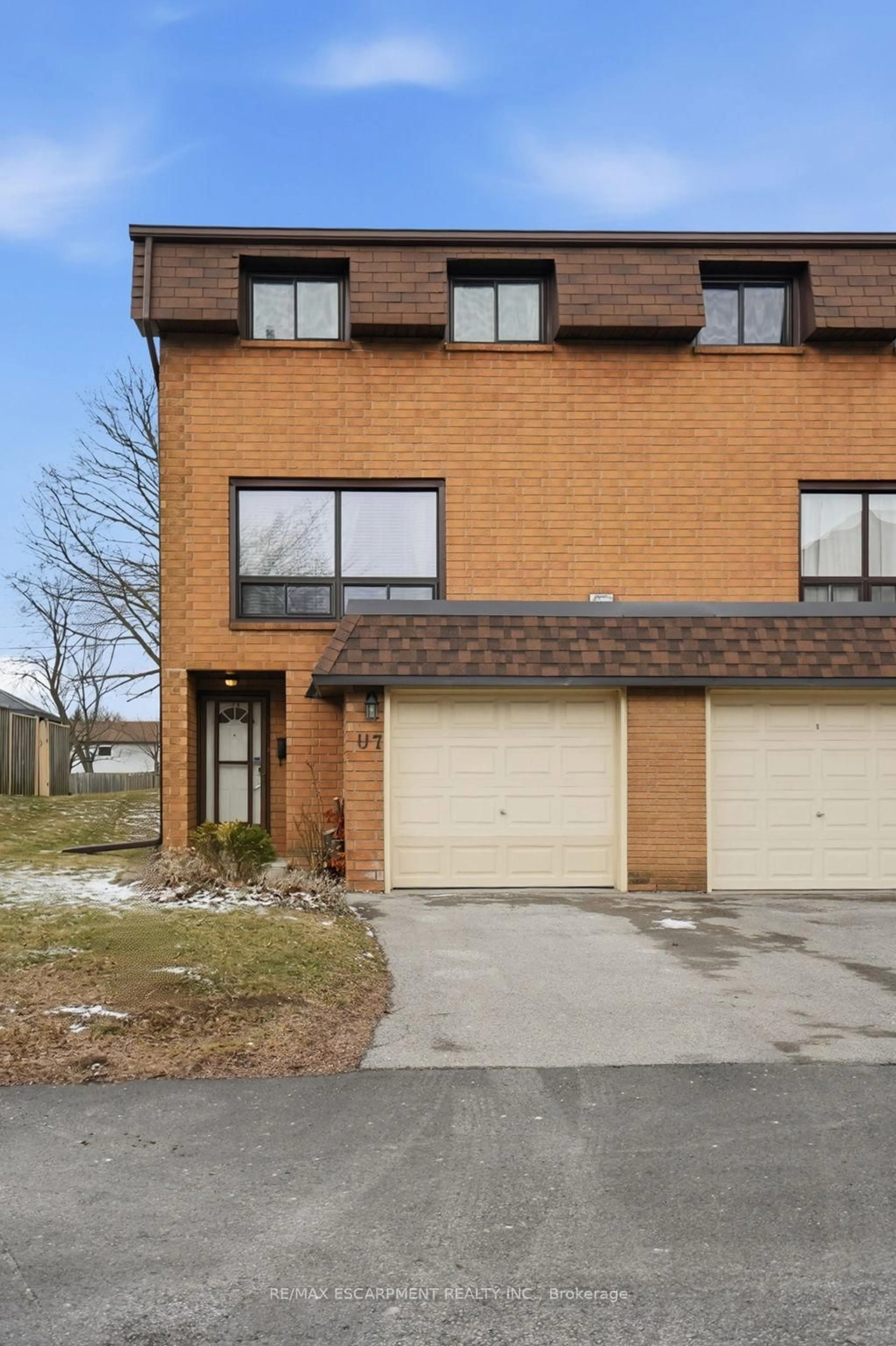 Home with brick exterior material, street for 444 Stone Church Rd #U7, Hamilton Ontario L9B 1R1