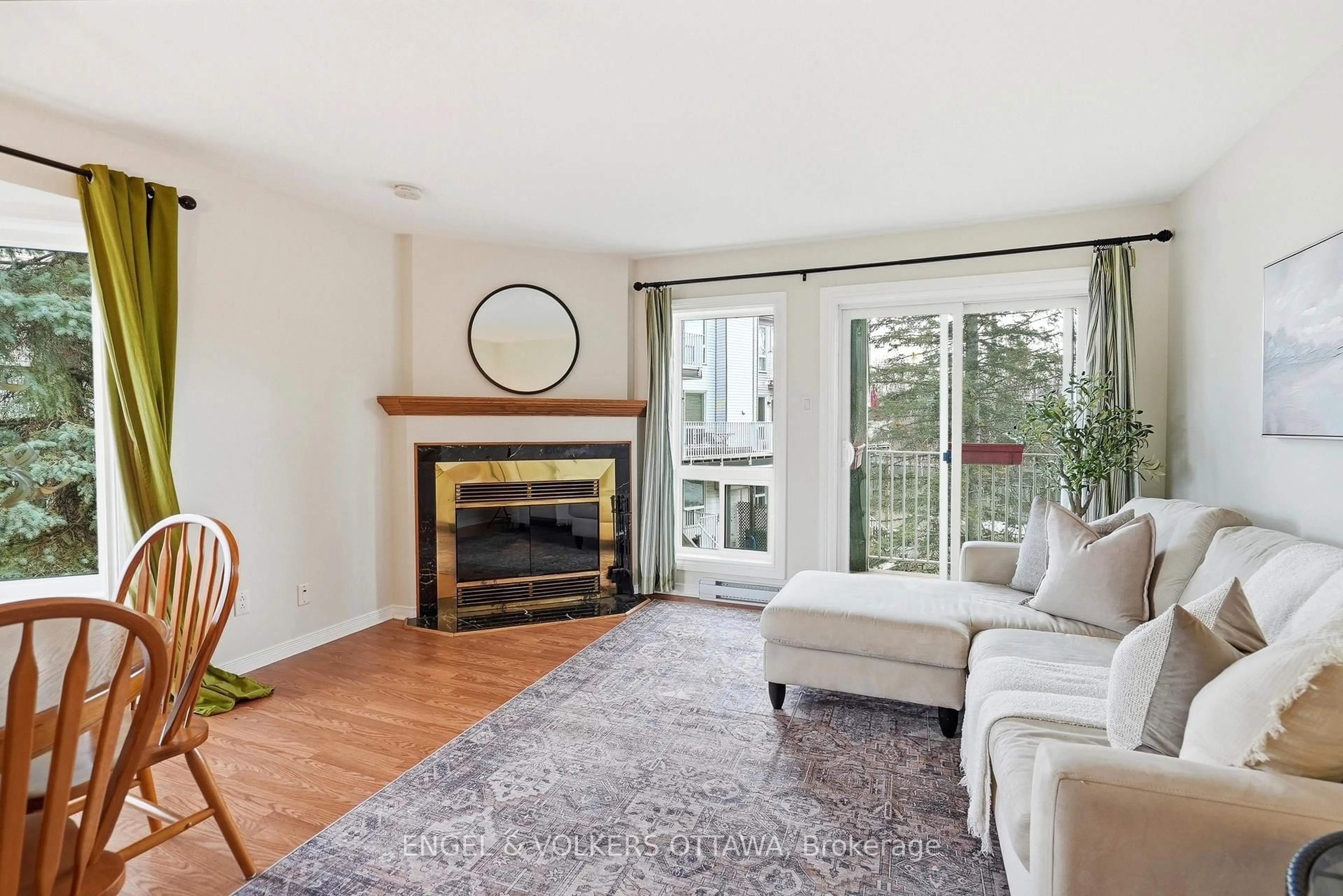 Living room with furniture, wood/laminate floor for 244 Briston Private #40, Ottawa Ontario K1G 5P9