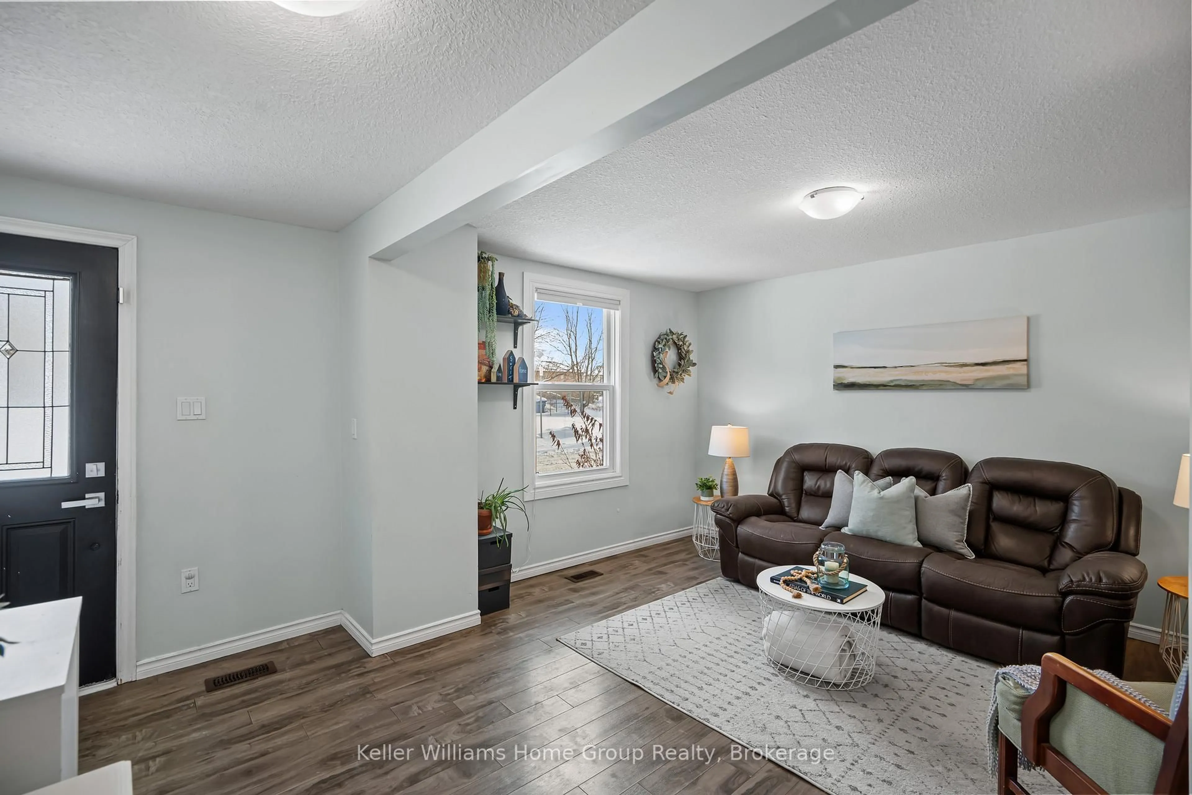 Living room with furniture, wood/laminate floor for 162 Alice St, Guelph Ontario N1E 3A1