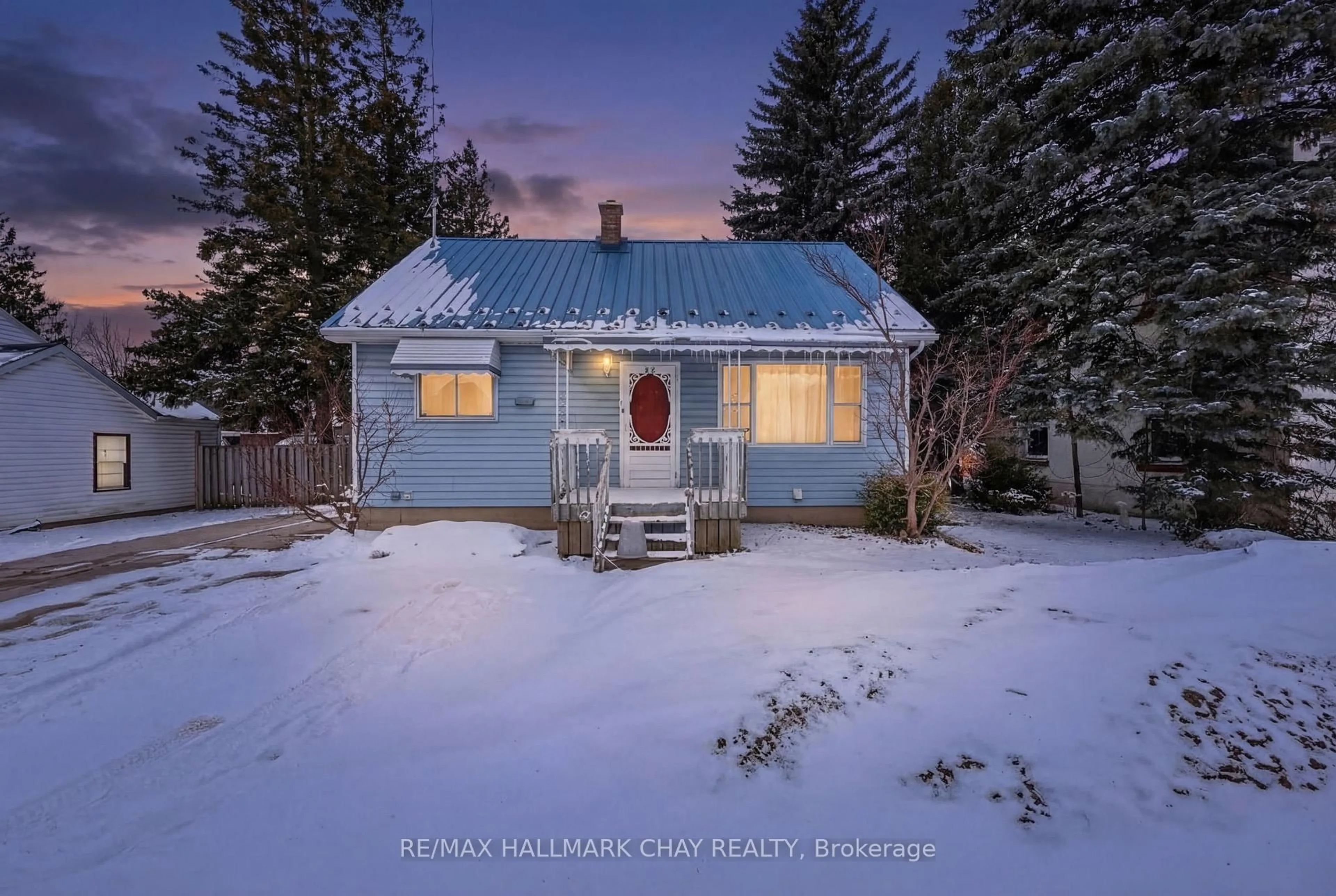 A pic from outside/outdoor area/front of a property/back of a property/a pic from drone, unknown for 415 Main St, Wellington North Ontario N0G 2L1