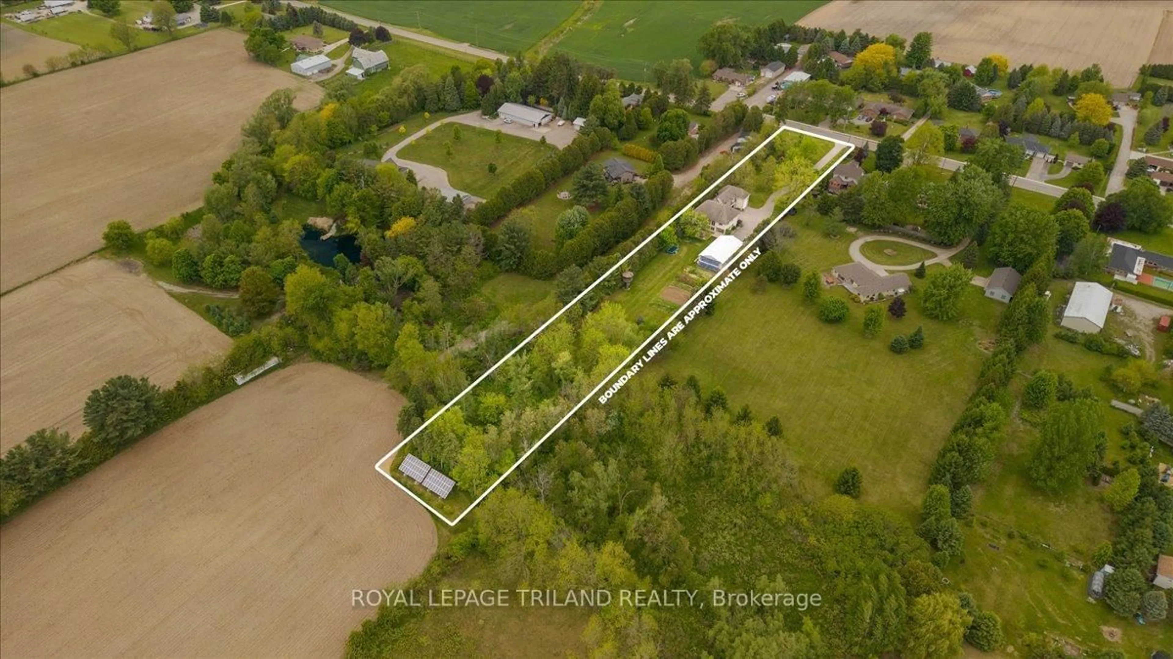 A pic from outside/outdoor area/front of a property/back of a property/a pic from drone, unknown for 3115 Napperton Dr, Adelaide Metcalfe Ontario N7G 3H8