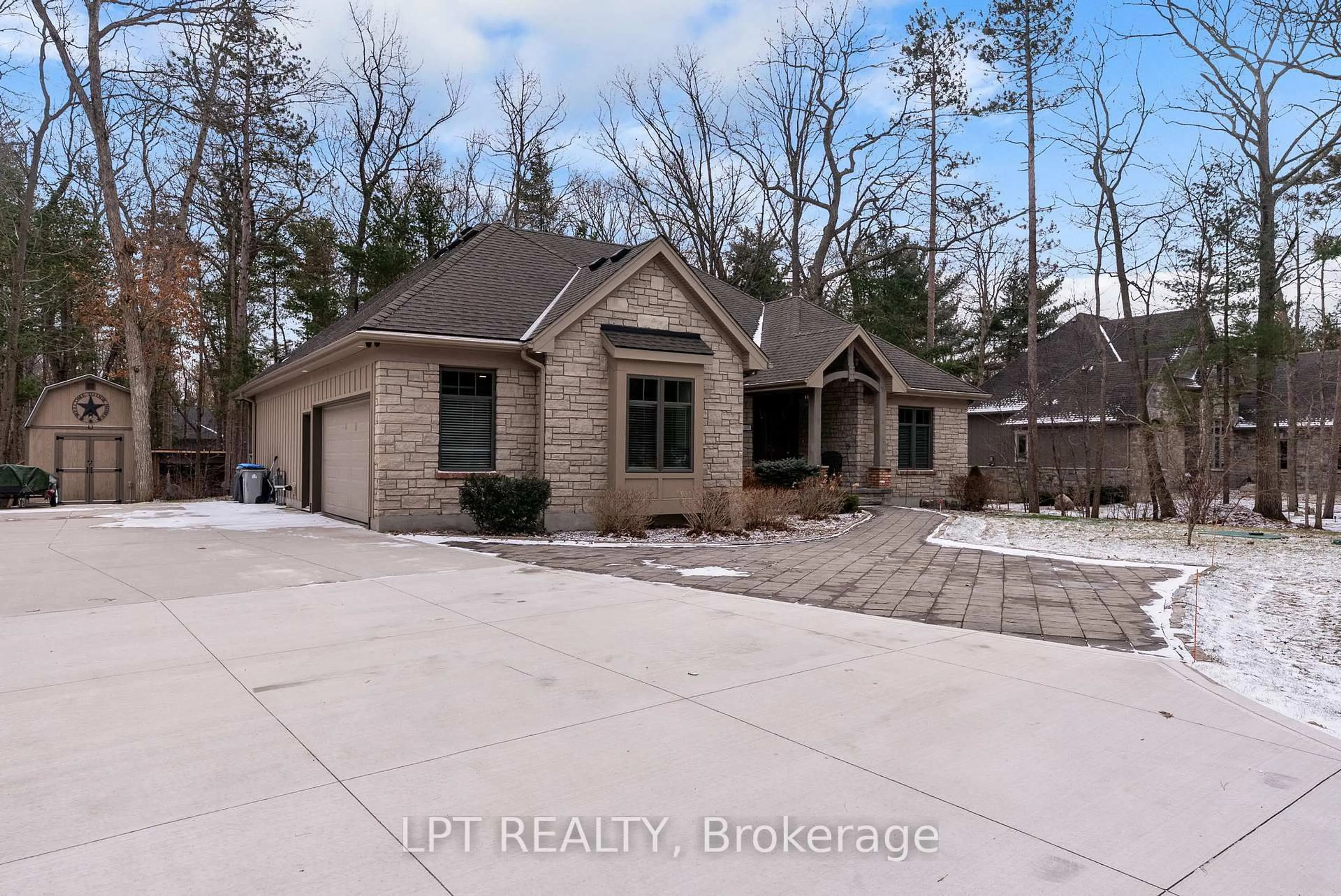 Home with brick exterior material, street for 8695 Timberwood Tr, Lambton Shores Ontario N0M 1T0