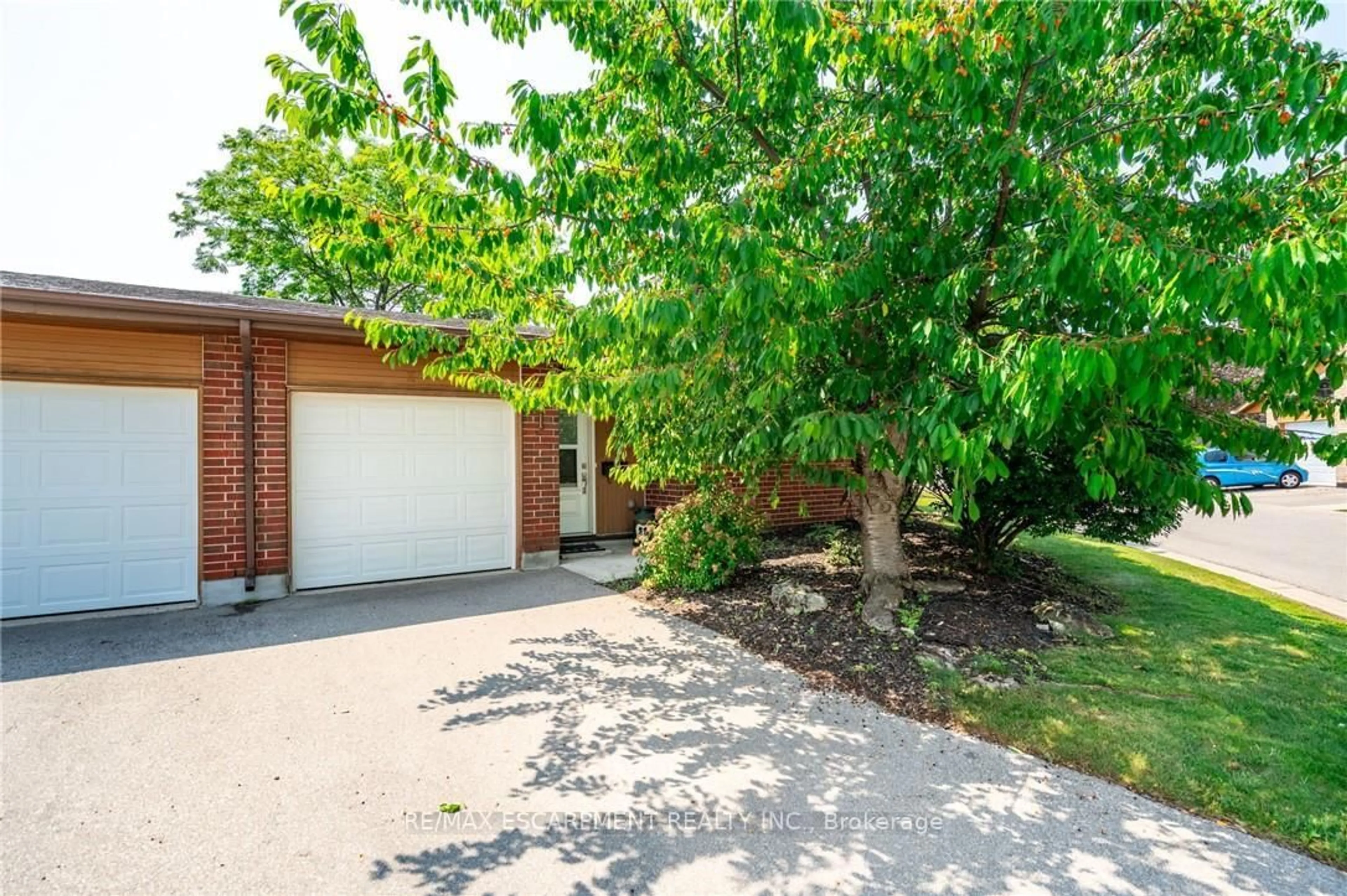 A pic from outside/outdoor area/front of a property/back of a property/a pic from drone, street for 1 Archdeacon Clark Tr, Hamilton Ontario L9B 2M2