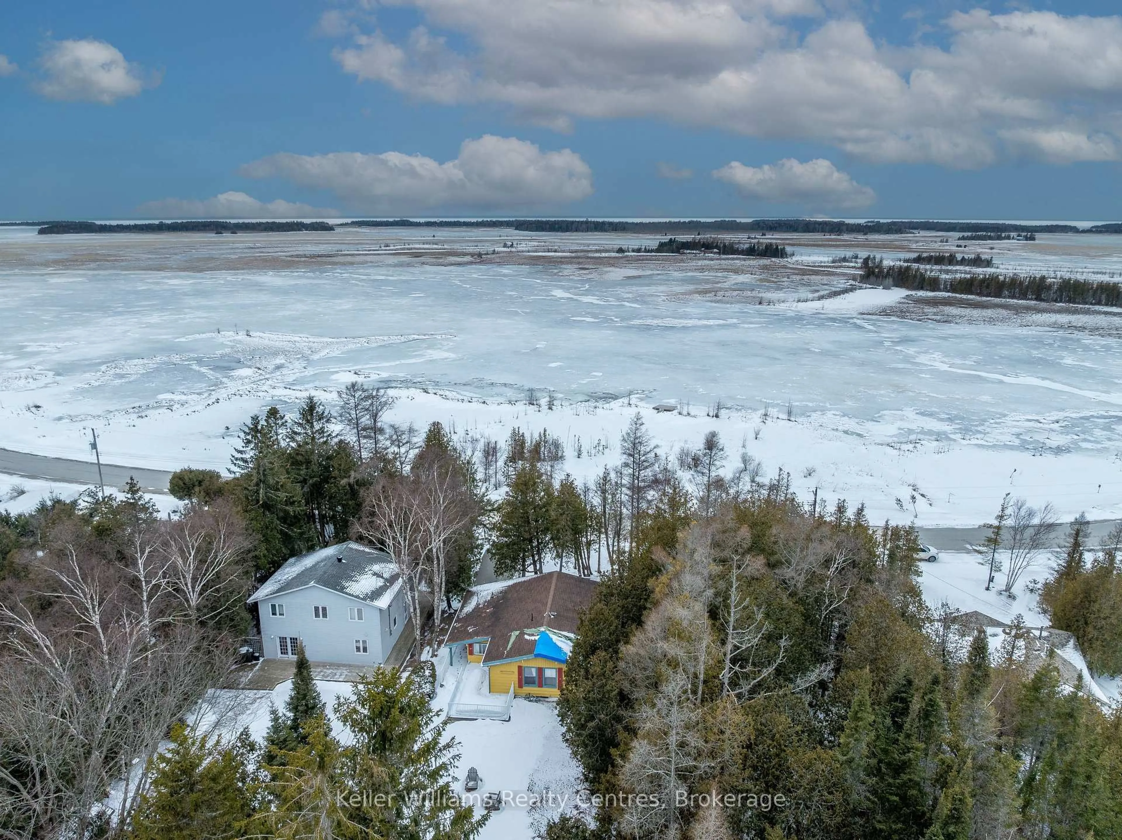 A pic from outside/outdoor area/front of a property/back of a property/a pic from drone, water/lake/river/ocean view for 93 SHORELINE Ave, South Bruce Peninsula Ontario N0H 2T0