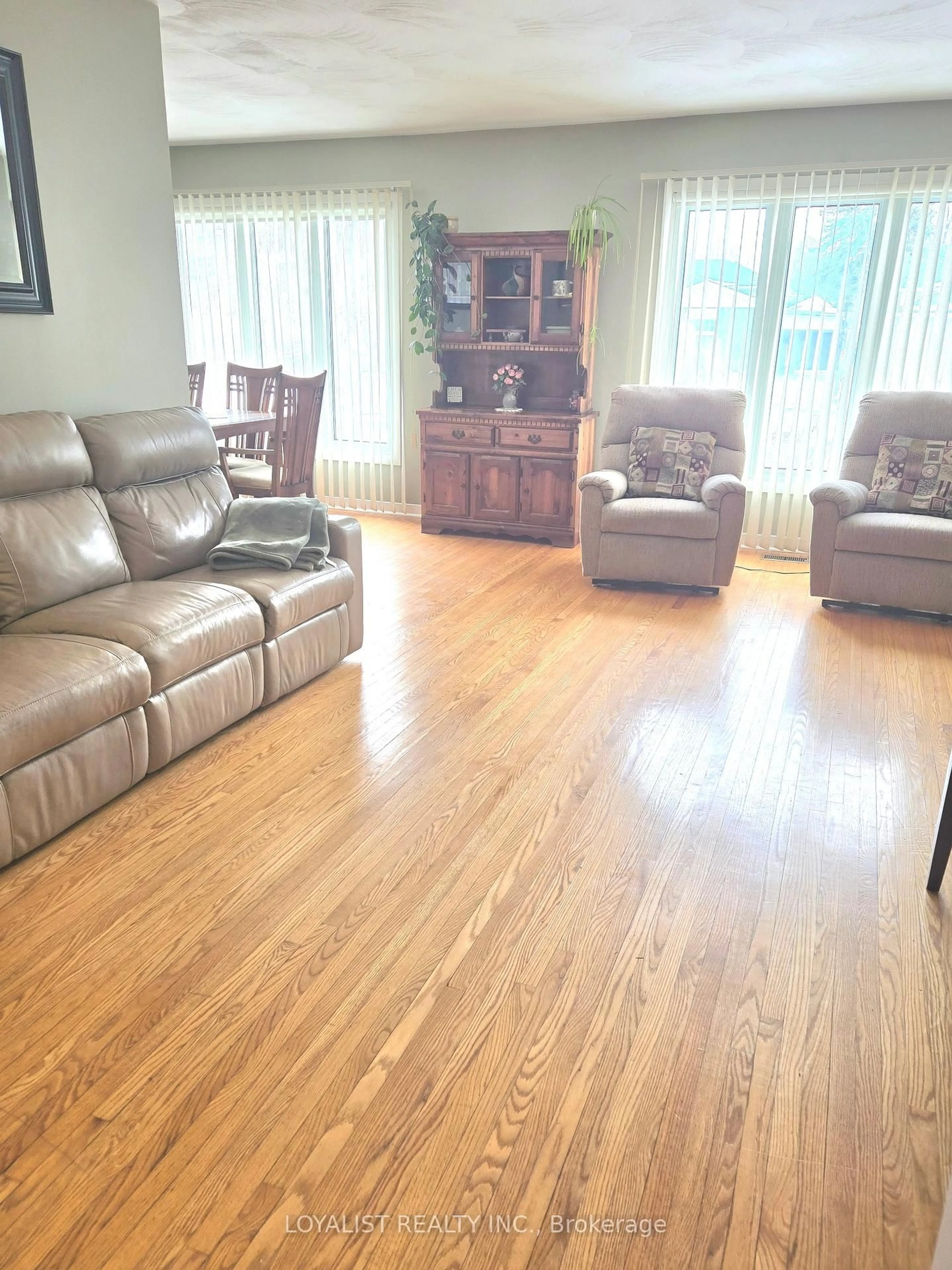Living room with furniture, wood/laminate floor for 80 Lemoine St, Belleville Ontario K8P 4G9
