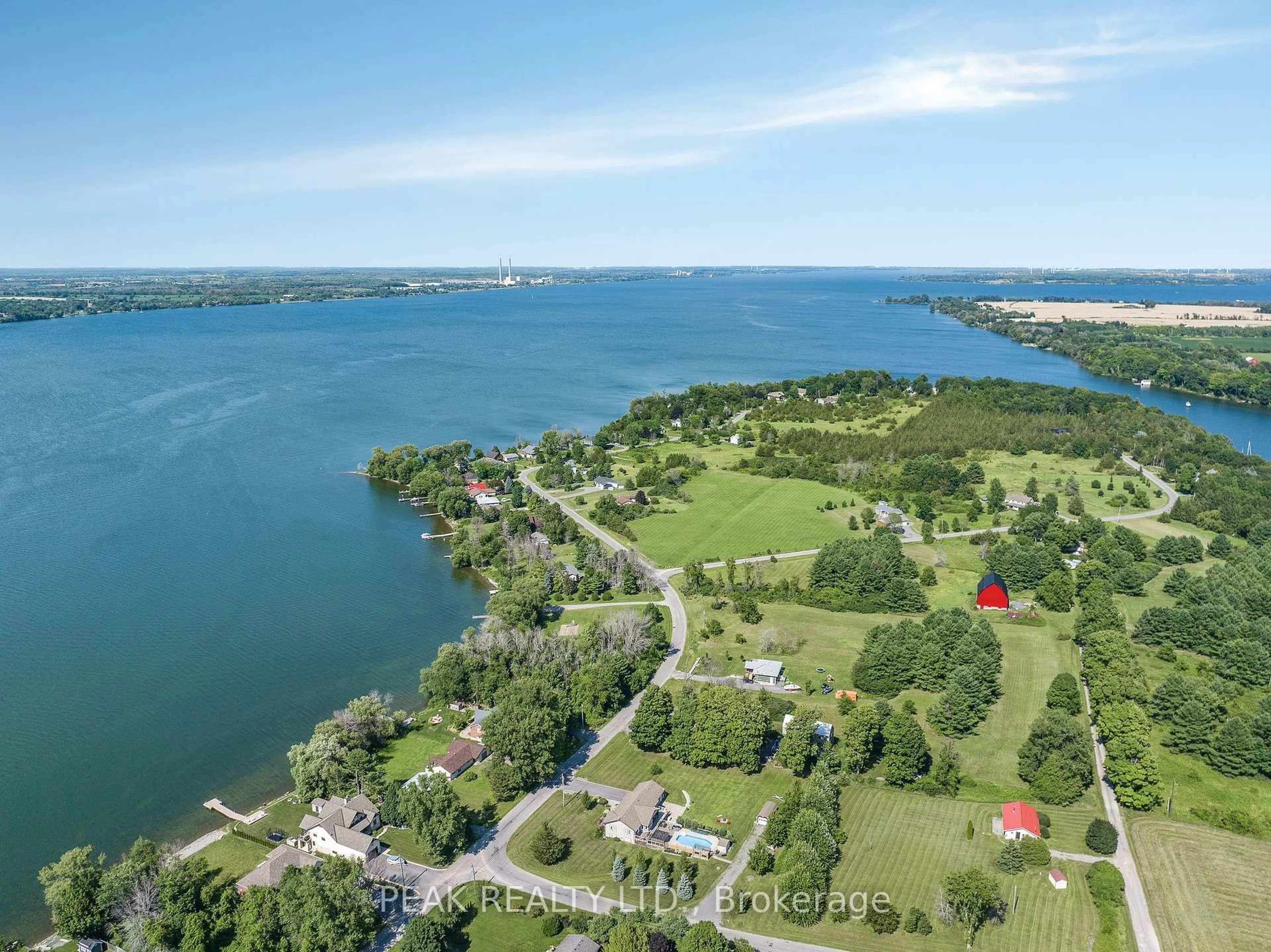 A pic from outside/outdoor area/front of a property/back of a property/a pic from drone, water/lake/river/ocean view for 116 Prinyers Cove Cres, Prince Edward County Ontario K0K 2T0