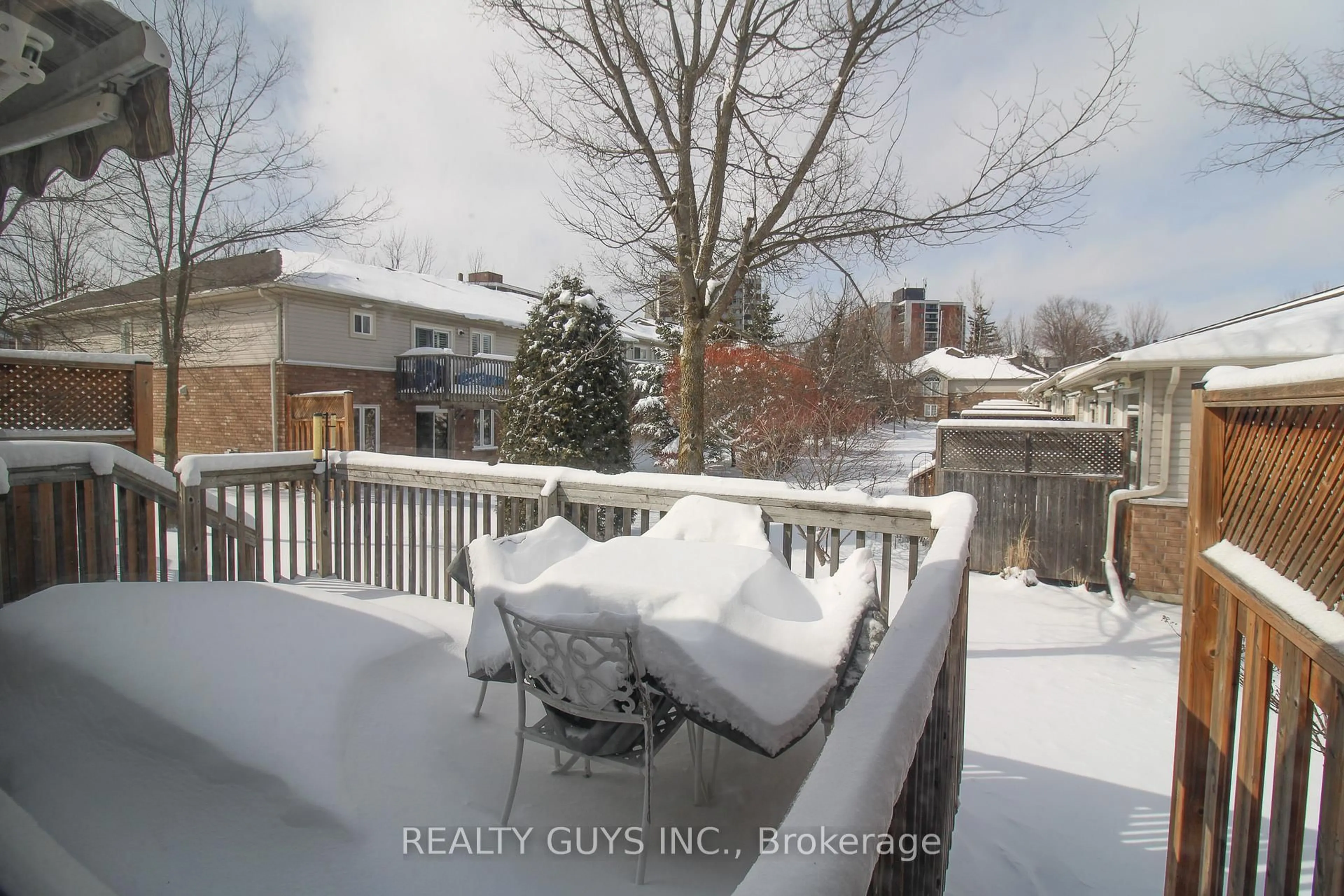 Patio, city buildings view from balcony for 909 Wentworth St #6, Peterborough Ontario K9J 8R7