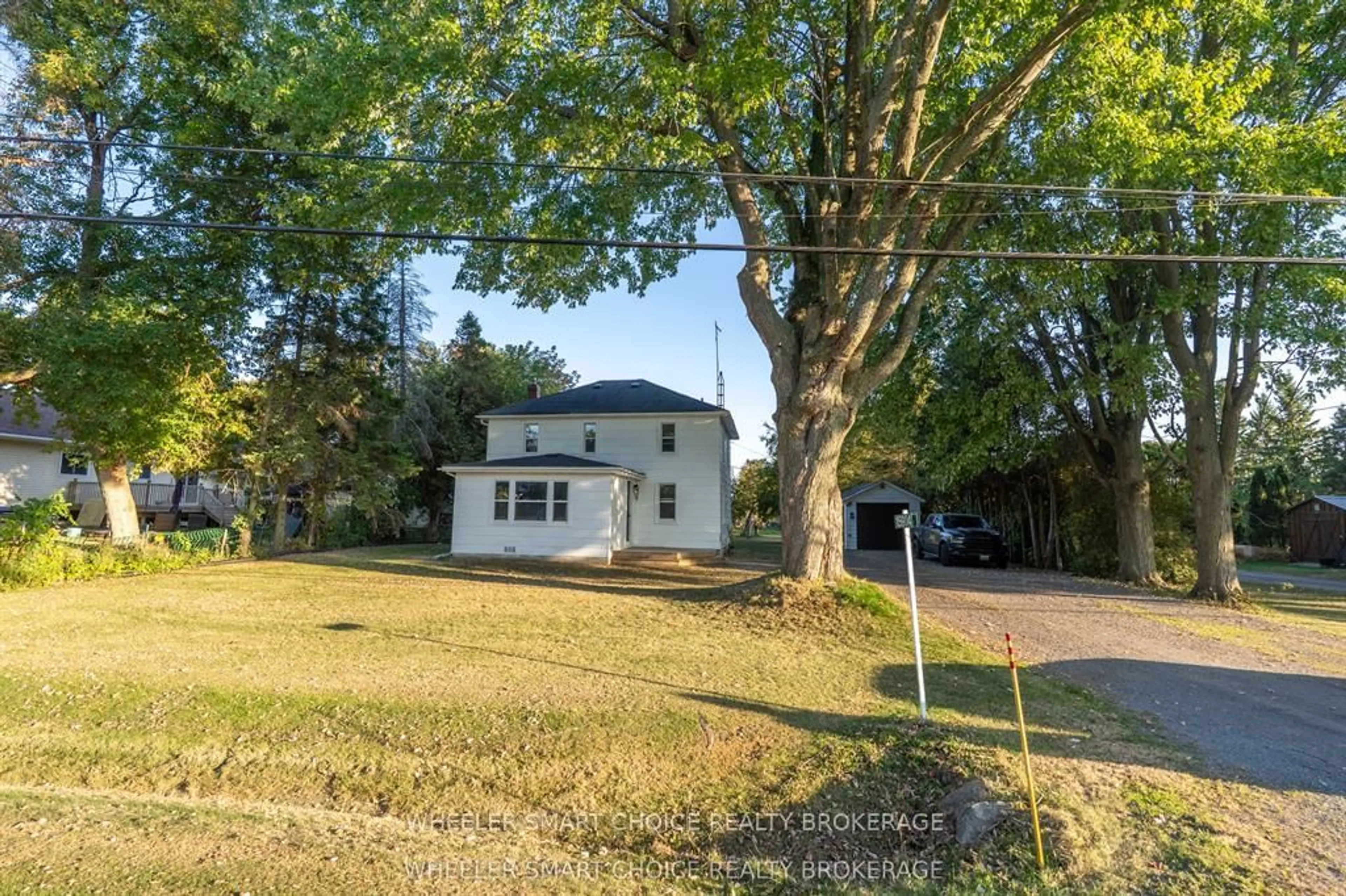 A pic from outside/outdoor area/front of a property/back of a property/a pic from drone, street for 15904 Manning Rd, South Stormont Ontario K0C 1M0