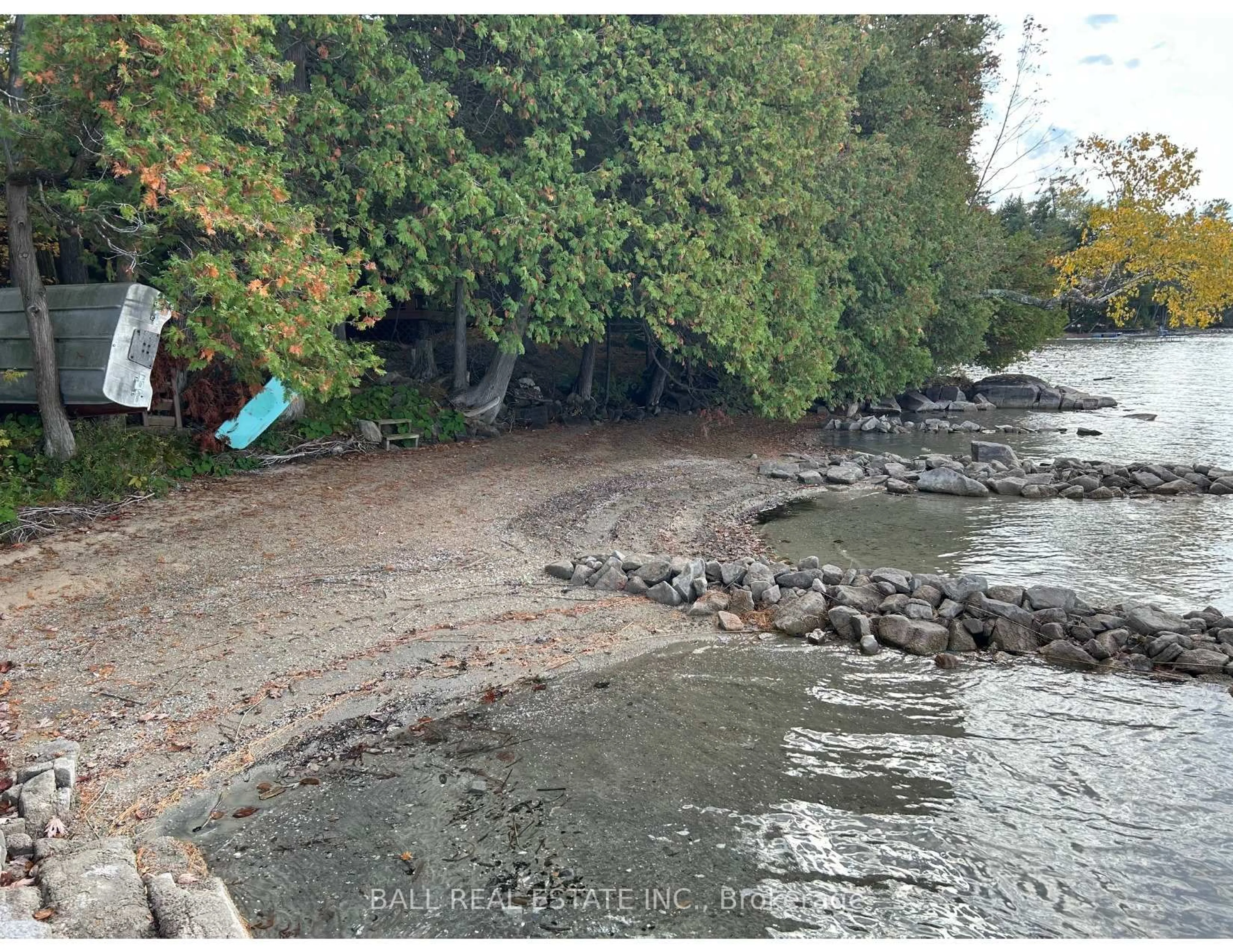 A pic from outside/outdoor area/front of a property/back of a property/a pic from drone, water/lake/river/ocean view for 127 Fire Route 42, Trent Lakes Ontario K0L 1J0