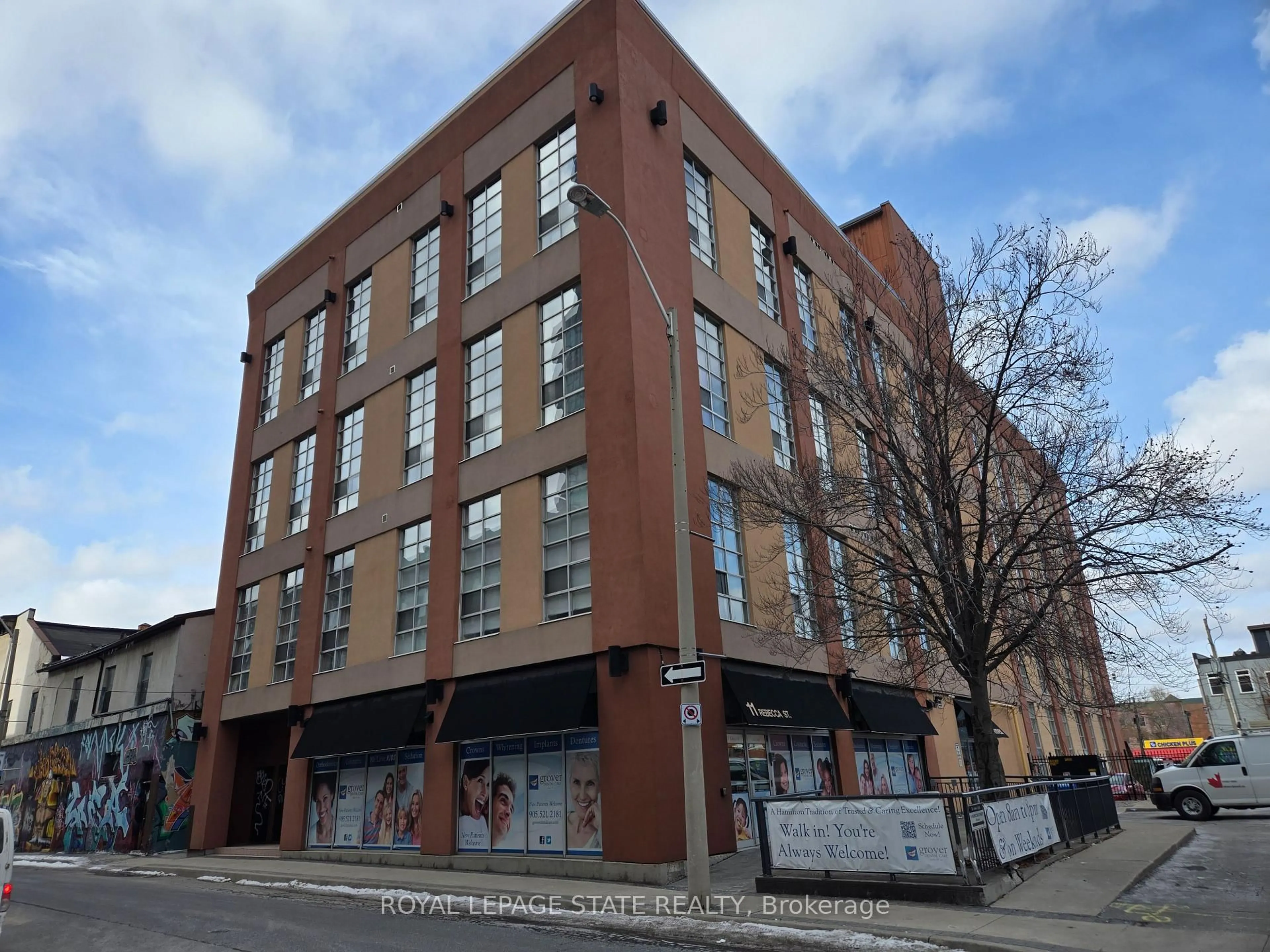 A pic from outside/outdoor area/front of a property/back of a property/a pic from drone, building for 11 Rebecca St #202, Hamilton Ontario L8R 3H7