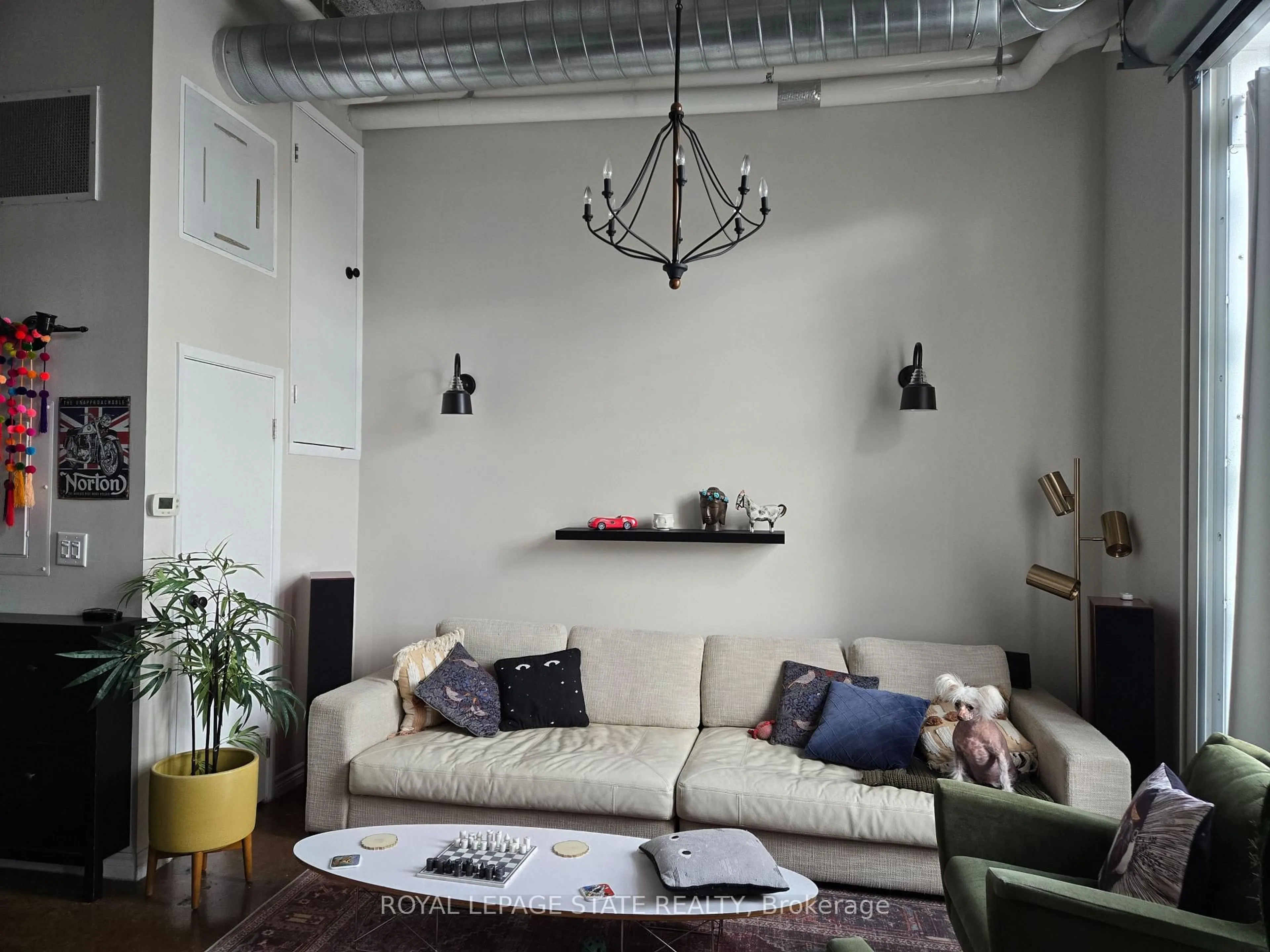 Living room with furniture, unknown for 11 Rebecca St #202, Hamilton Ontario L8R 3H7