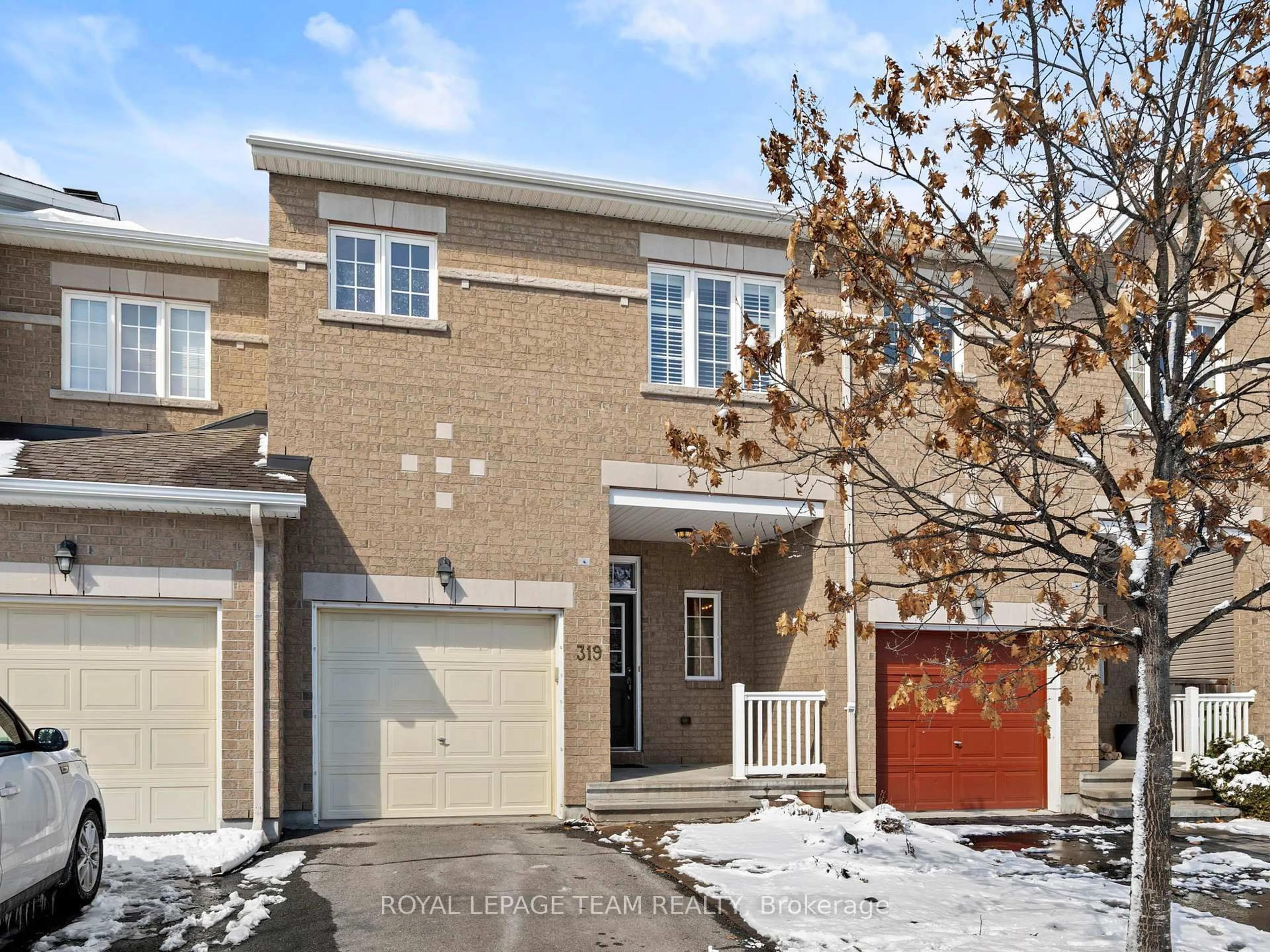 Home with brick exterior material, street for 319 Kingbrook Dr, Ottawa Ontario K2M 0G1