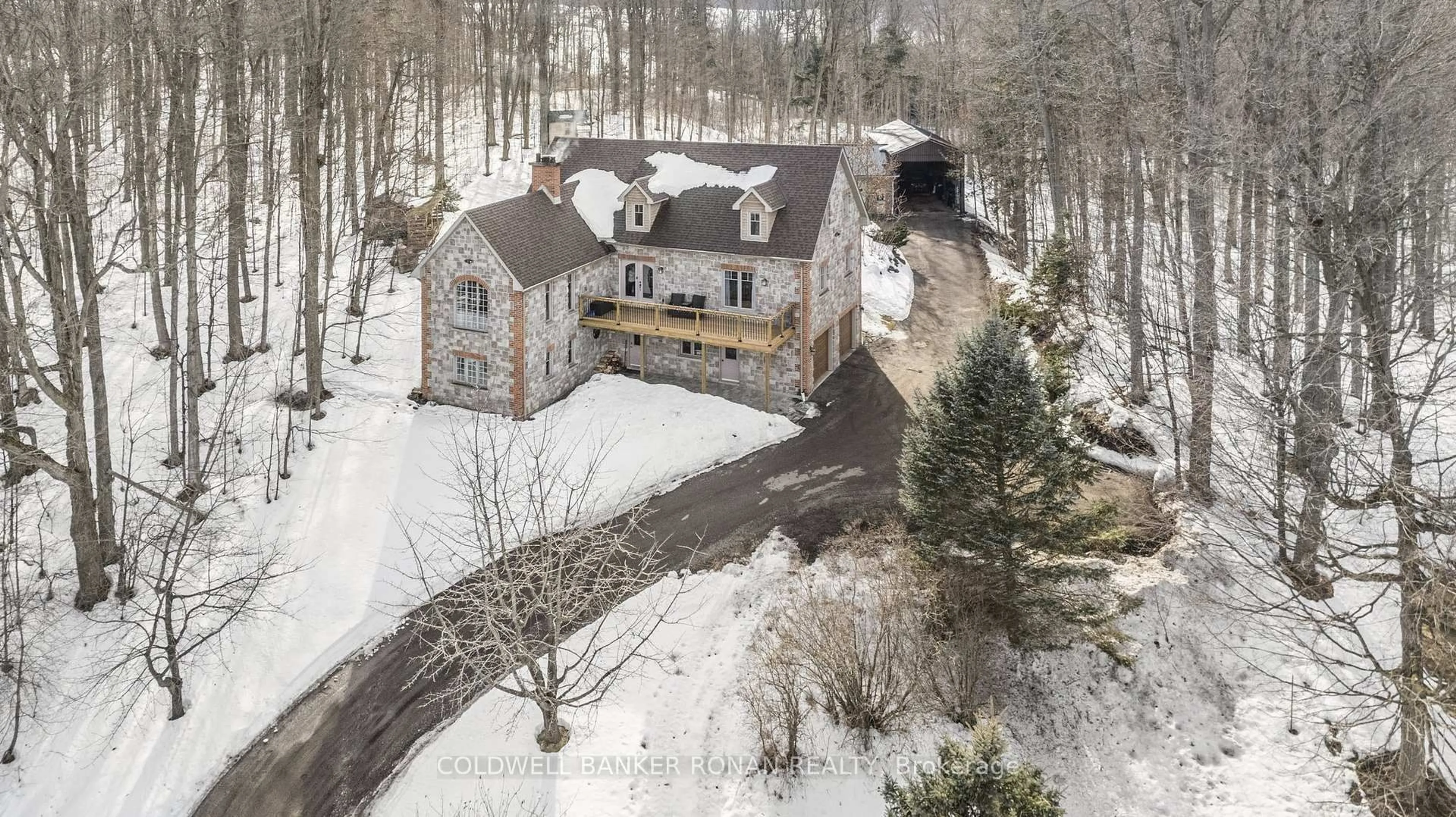 A pic from outside/outdoor area/front of a property/back of a property/a pic from drone, mountain view for 38 Big Tree Circ, Mulmur Ontario L0M 1M0