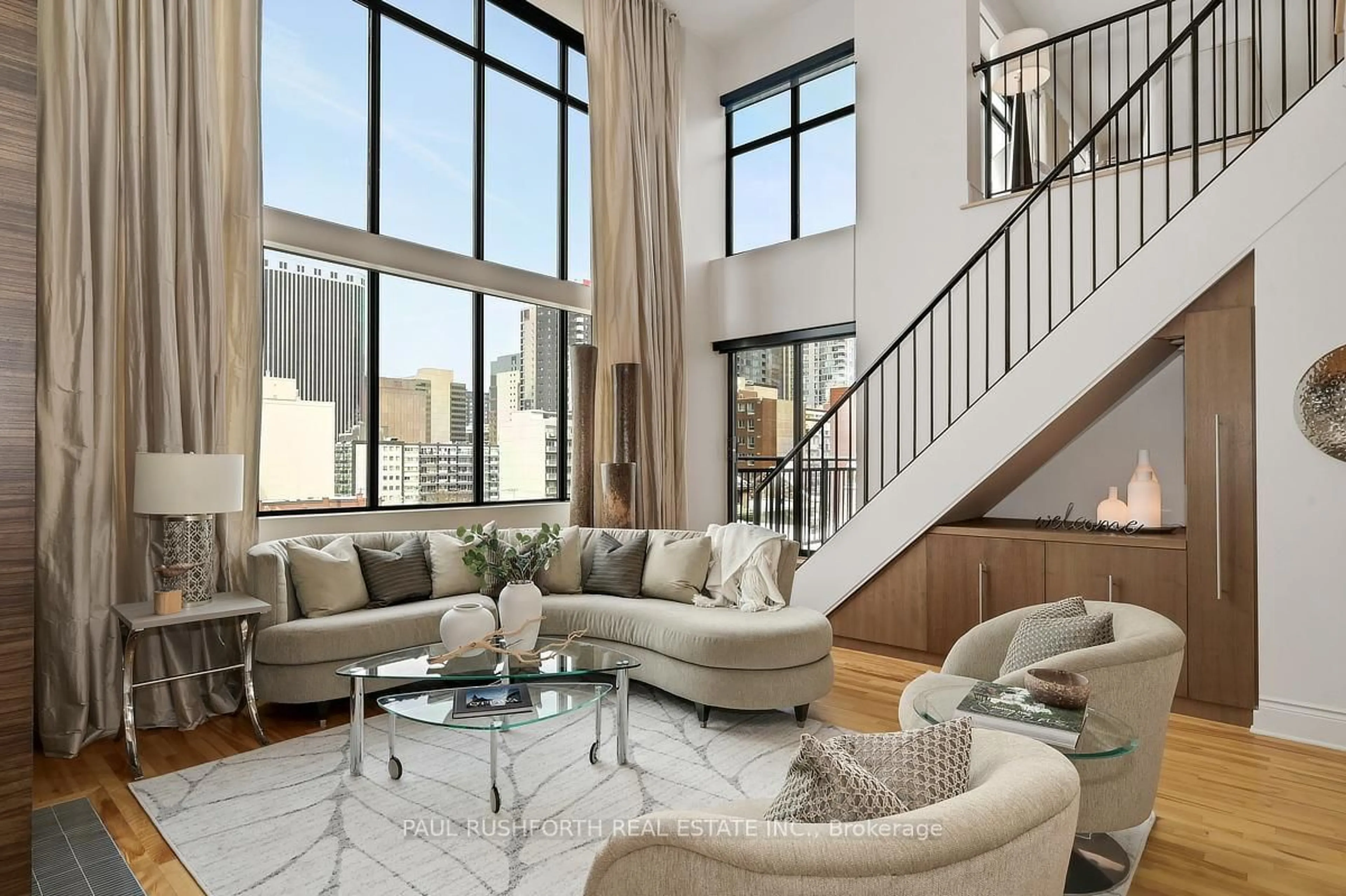 Living room with furniture, unknown for 364 Cooper St #PH2, Ottawa Ontario K2P 2P3