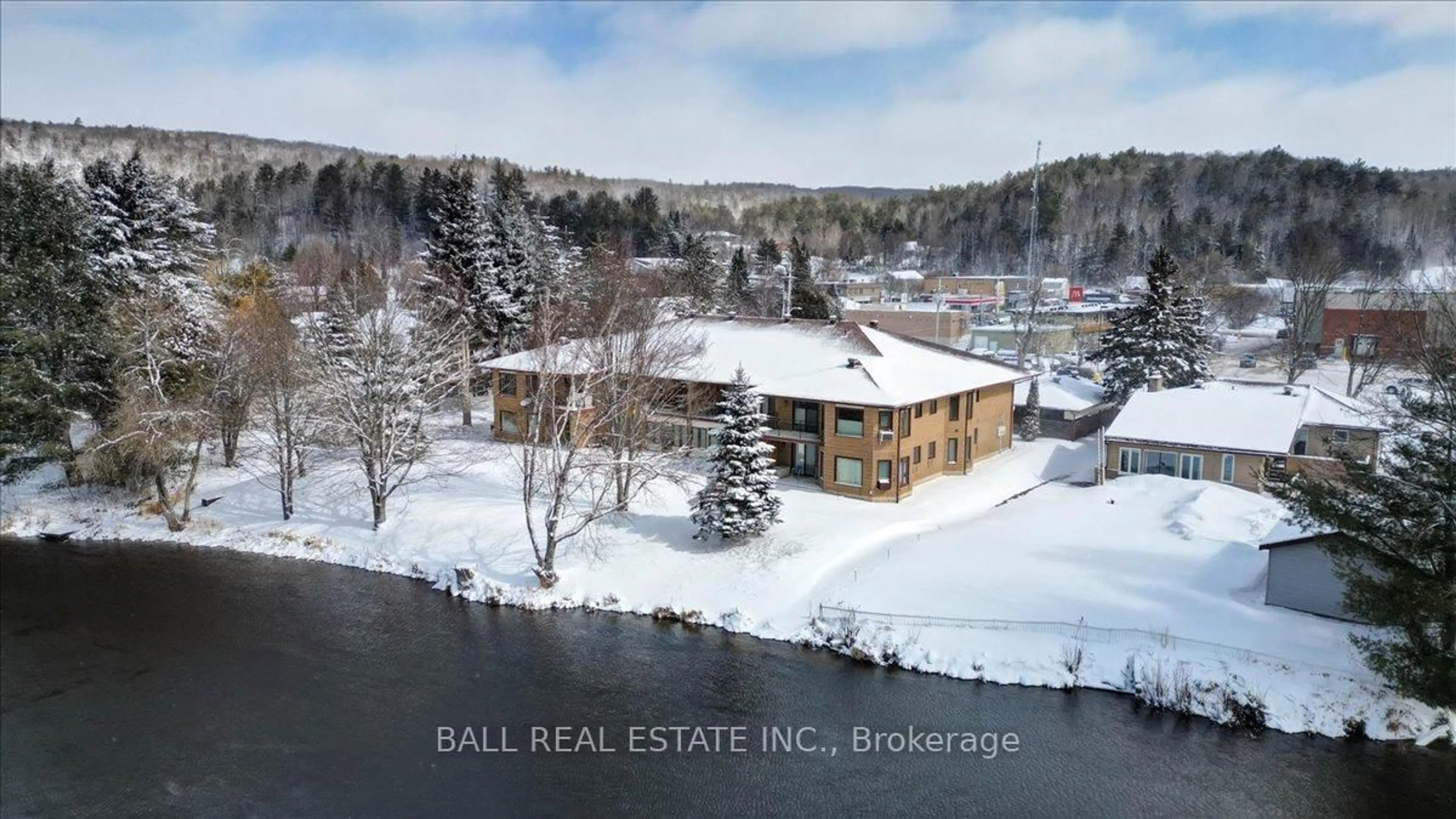 A pic from outside/outdoor area/front of a property/back of a property/a pic from drone, water/lake/river/ocean view for 16 Alice St #103, Bancroft Ontario K0L 1C0