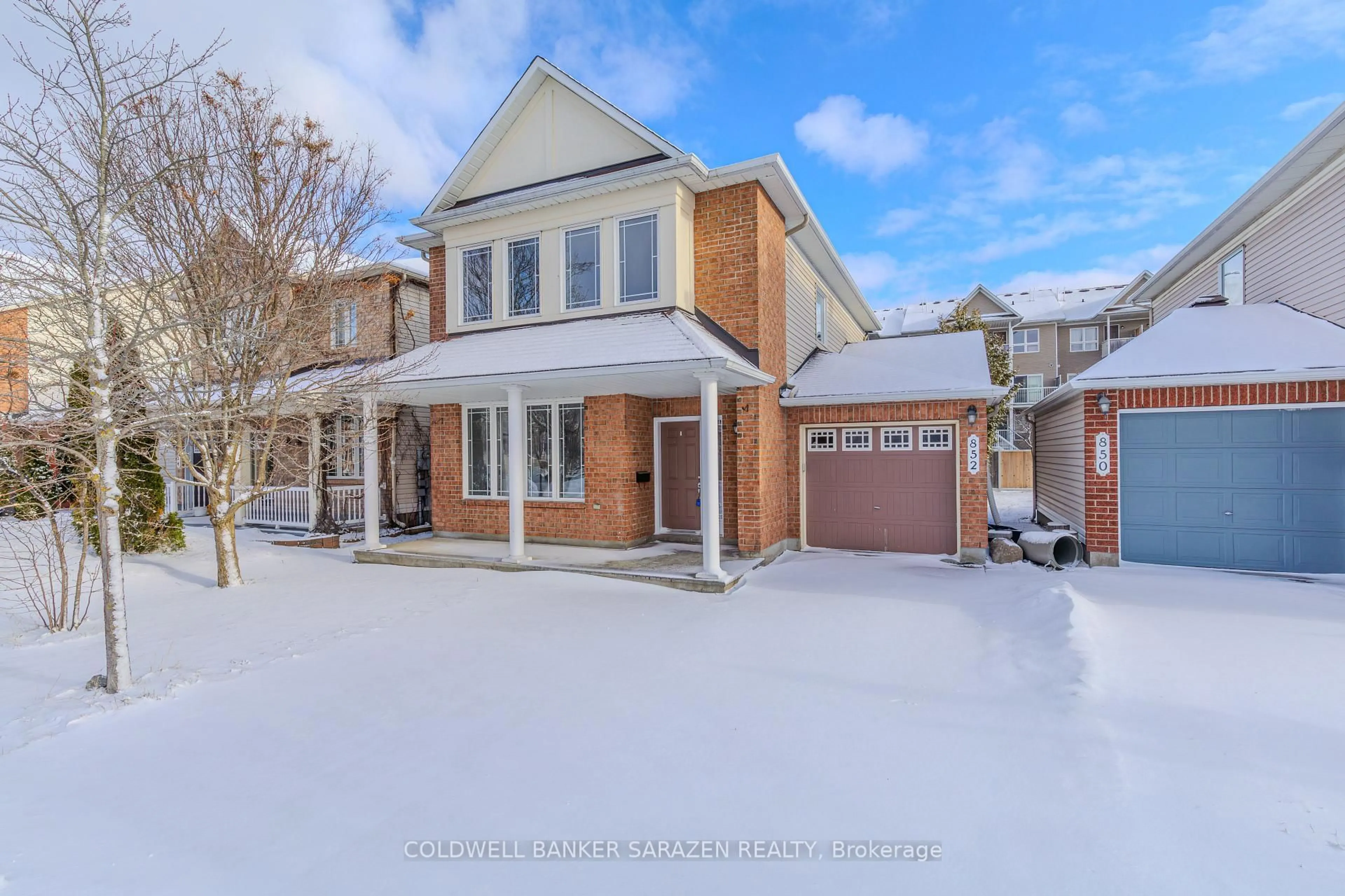 Home with brick exterior material, street for 852 Taradale Dr, Ottawa Ontario K2J 5P3