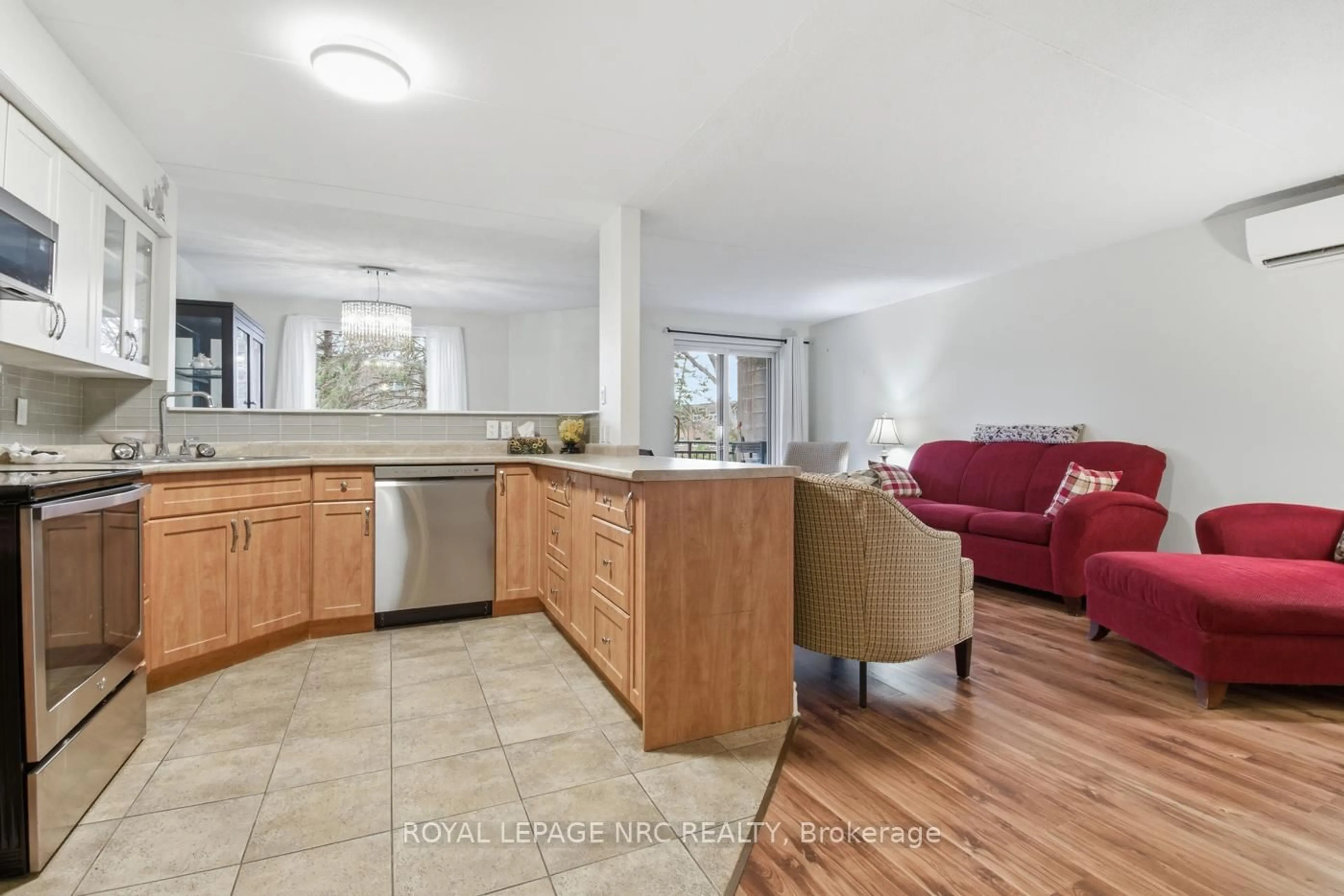 Open concept kitchen, unknown for 4658 Drummond Rd #217, Niagara Falls Ontario L2E 7E1