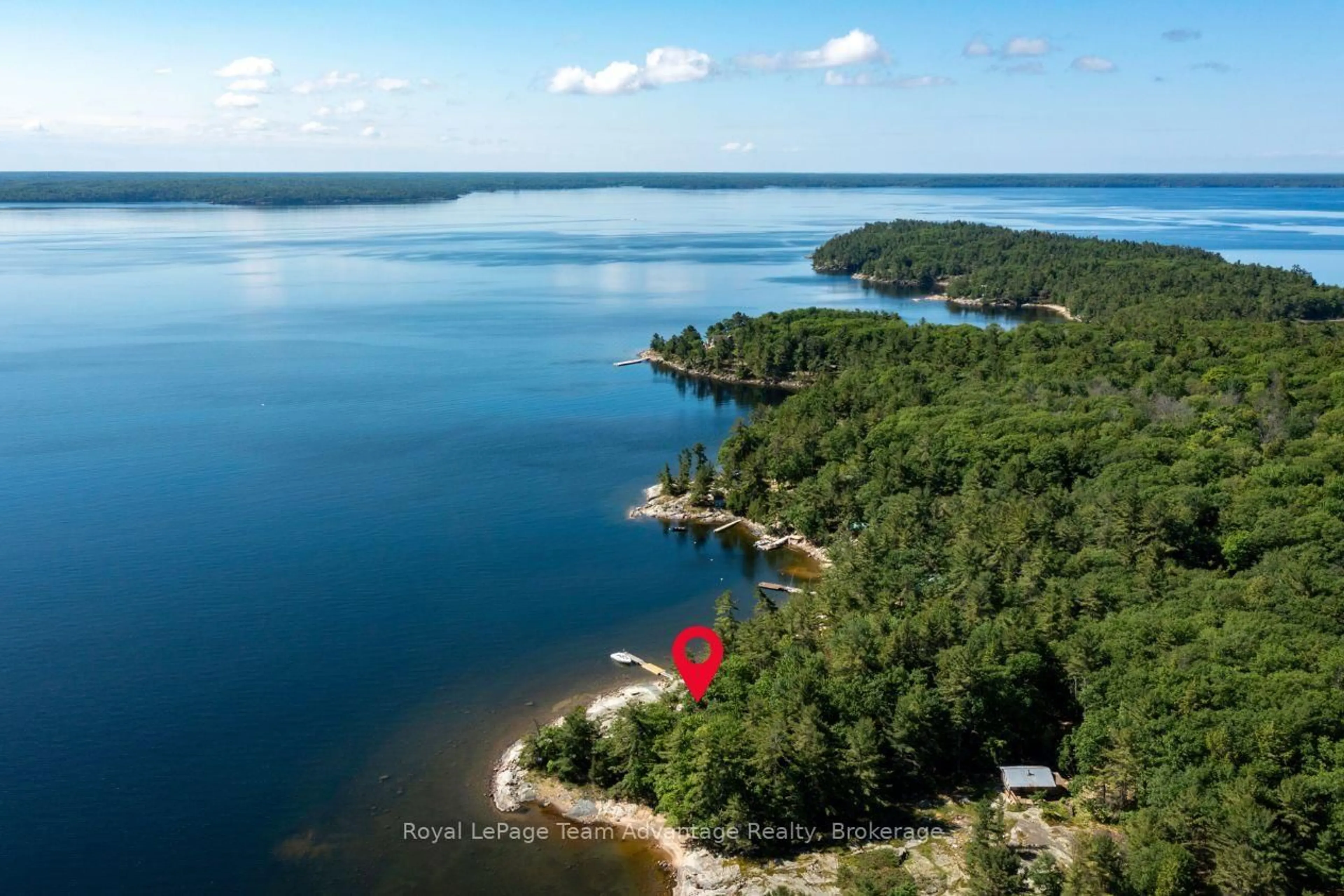 A pic from outside/outdoor area/front of a property/back of a property/a pic from drone, water/lake/river/ocean view for 36 15C Island, Carling Ontario P0G 1G0