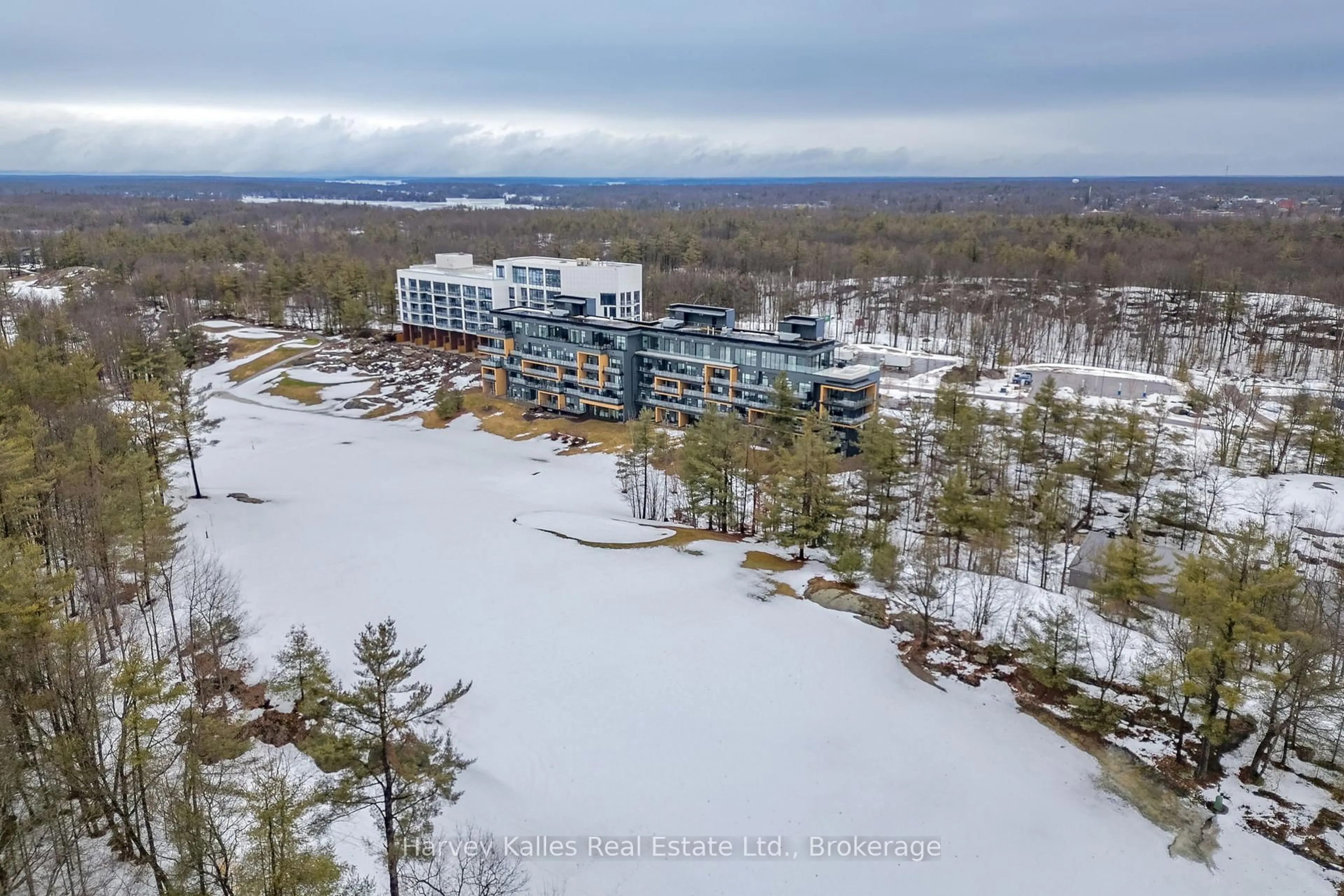 A pic from outside/outdoor area/front of a property/back of a property/a pic from drone, water/lake/river/ocean view for 120 Carrick Tr #401, Gravenhurst Ontario P1P 0B6