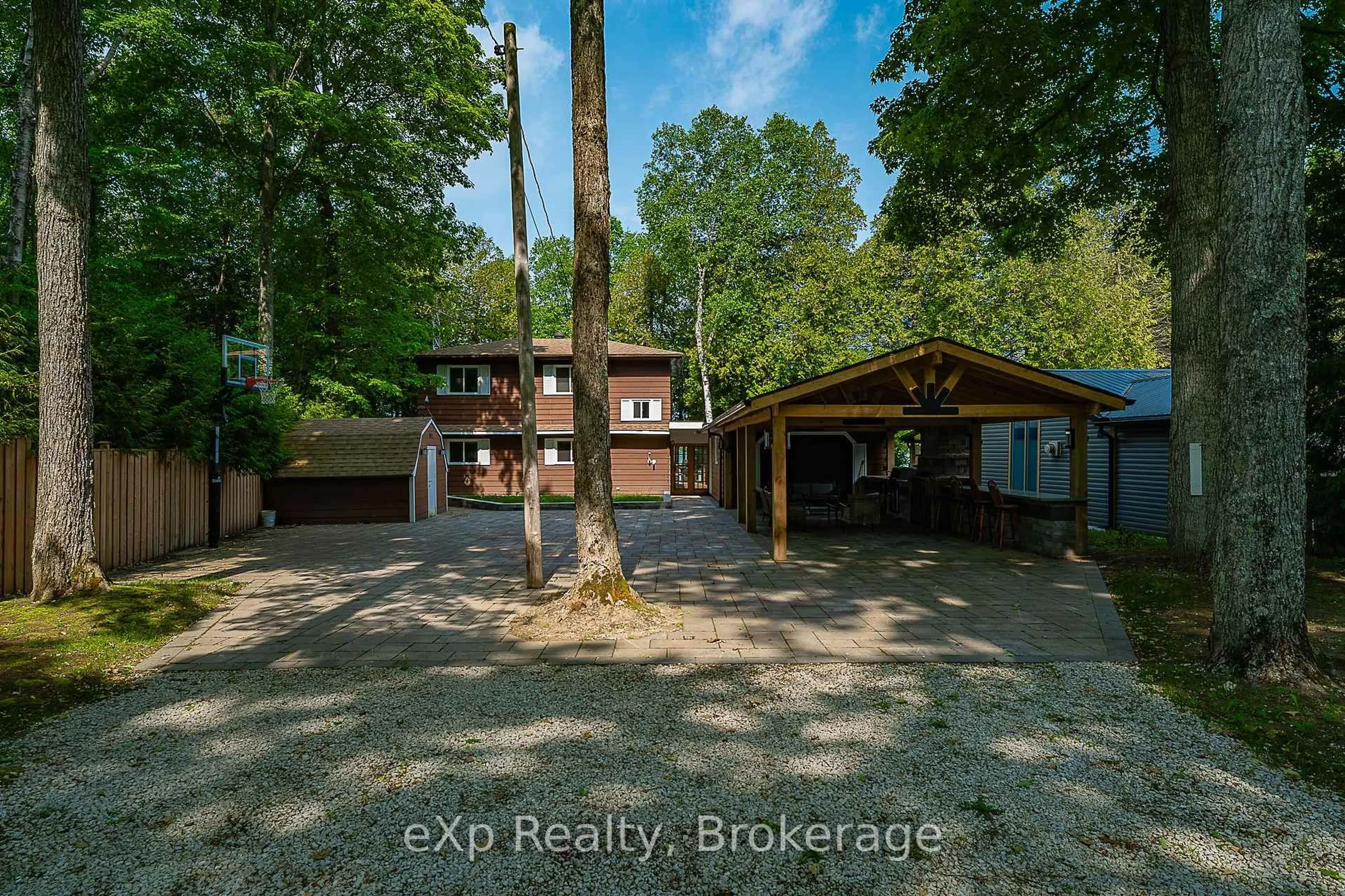 A pic from outside/outdoor area/front of a property/back of a property/a pic from drone, forest/trees view for 170 Francis Dr, Georgian Bluffs Ontario N0H 2K0