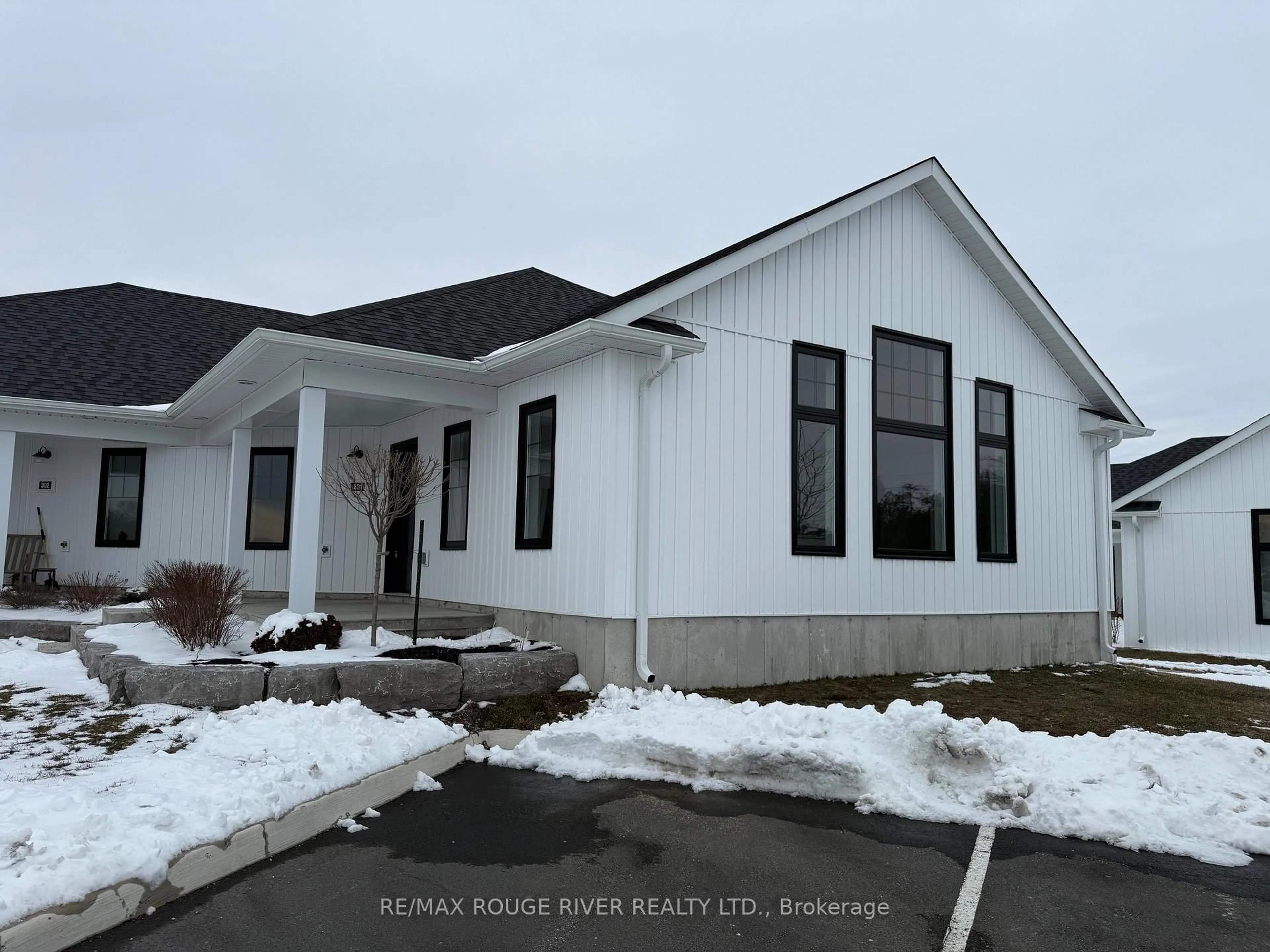 Home with vinyl exterior material, building for 14 MEADOWCREEK Dr #301, Brighton Ontario K0K 1H0