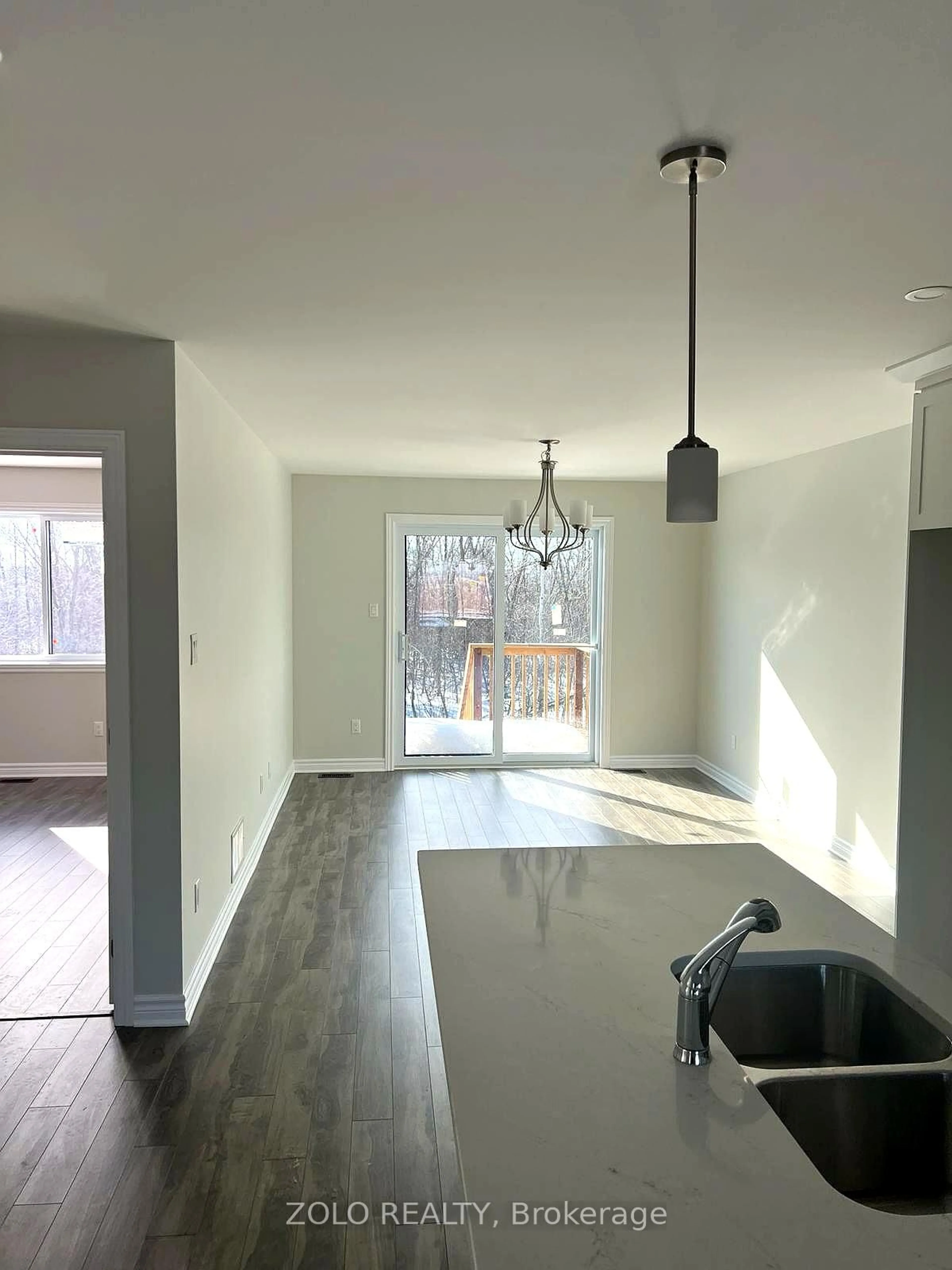 Open concept kitchen, wood/laminate floor for 210 Ruby Dr, Cornwall Ontario K6H 0J9