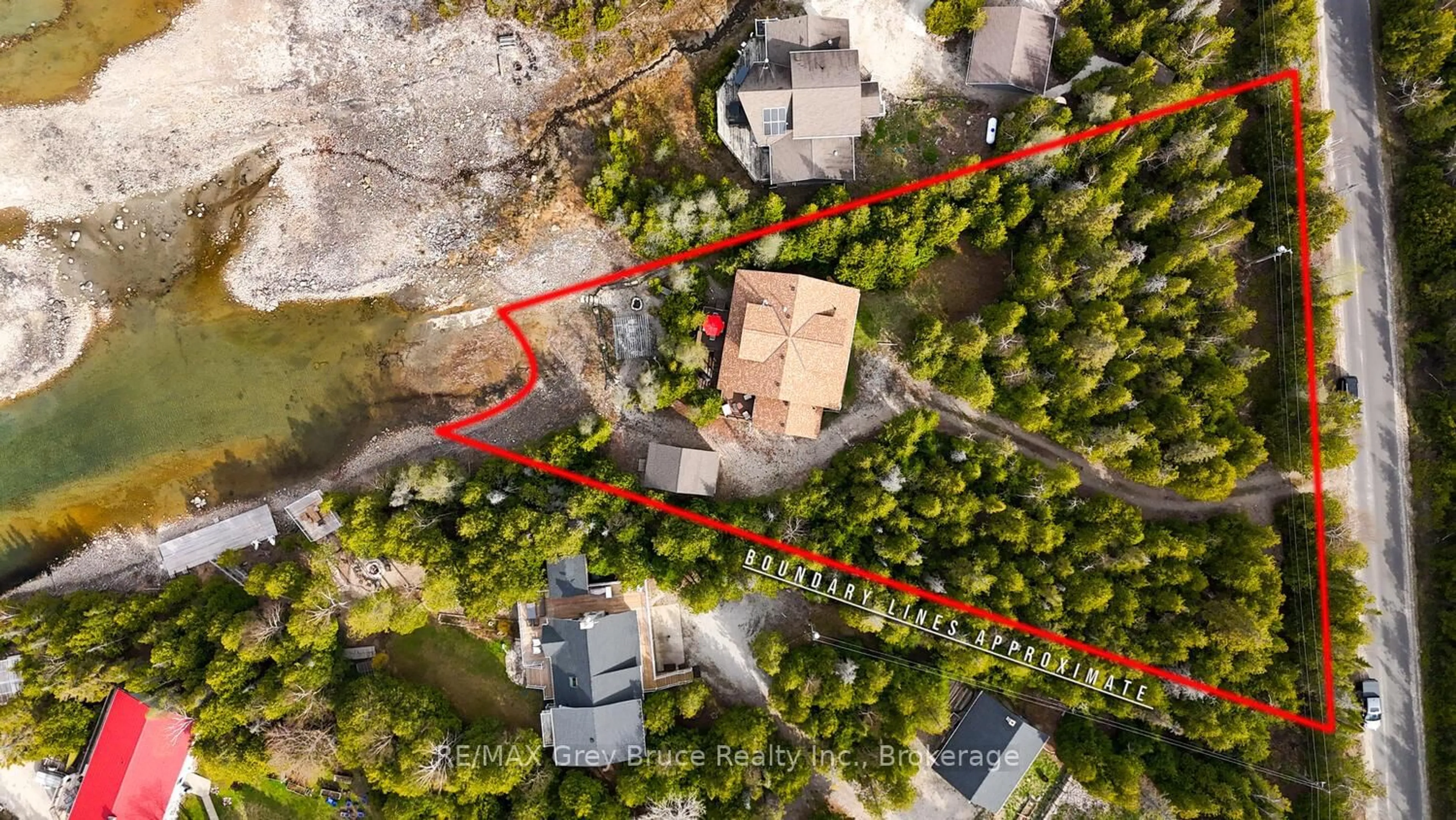 A pic from outside/outdoor area/front of a property/back of a property/a pic from drone, street for 205 Eagle Rd, Northern Bruce Peninsula Ontario N0H 2R0
