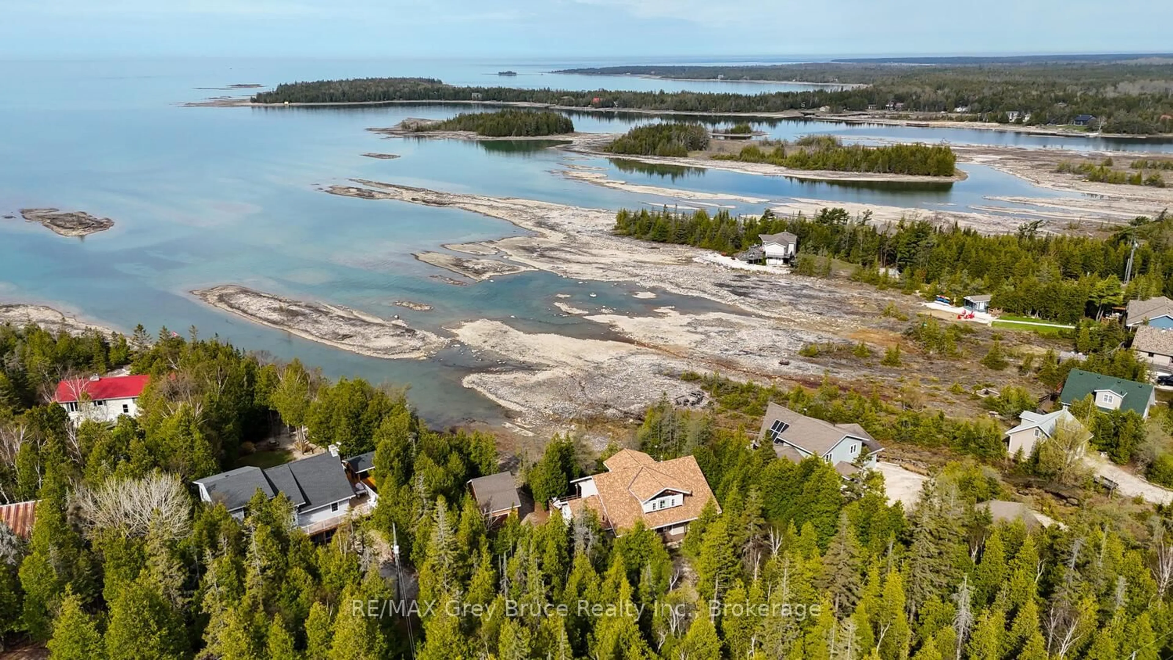 A pic from outside/outdoor area/front of a property/back of a property/a pic from drone, water/lake/river/ocean view for 205 Eagle Rd, Northern Bruce Peninsula Ontario N0H 2R0