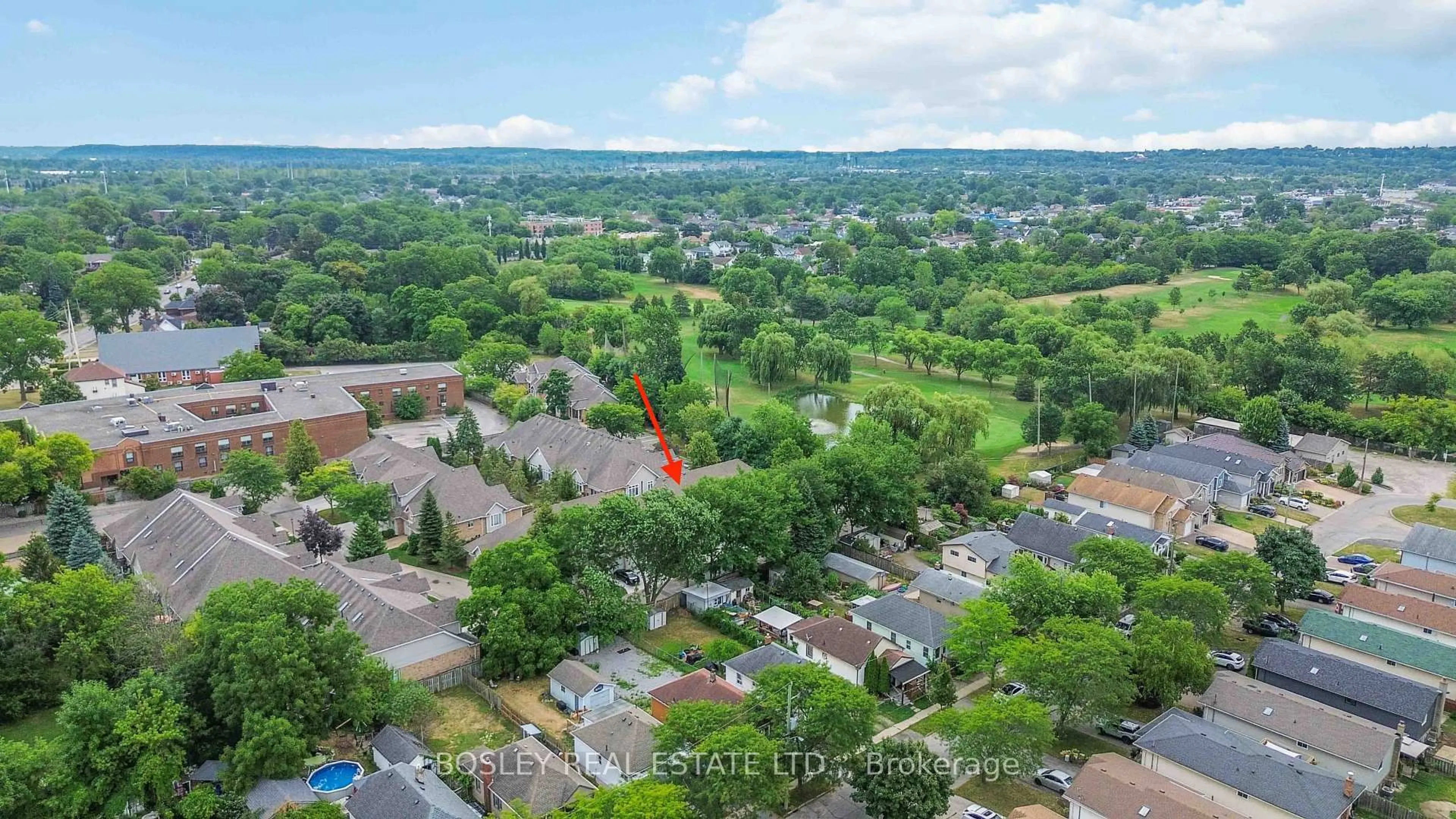 A pic from outside/outdoor area/front of a property/back of a property/a pic from drone, unknown for 308 Queenston St #14, St. Catharines Ontario L2P 2X4