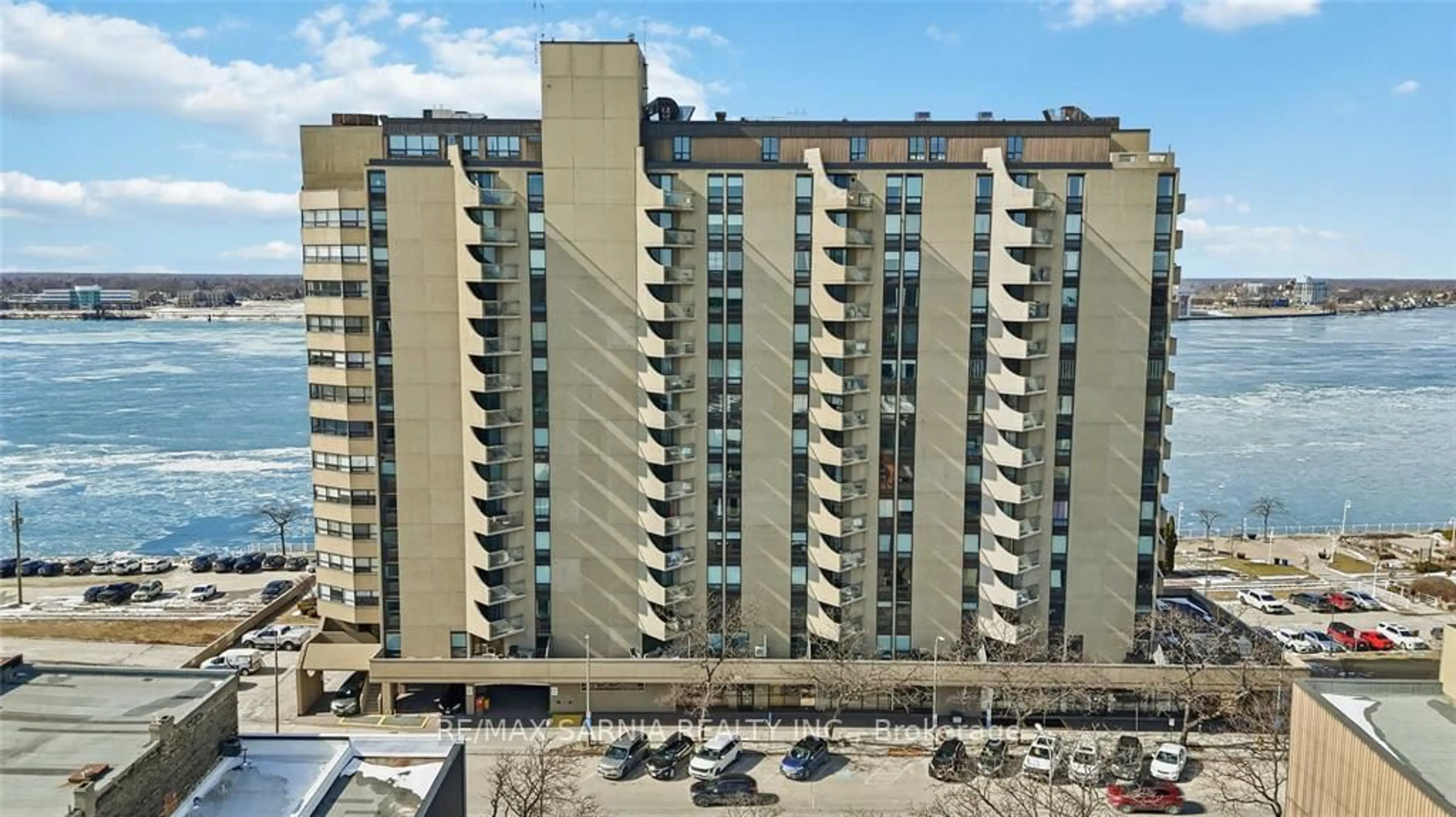 A pic from outside/outdoor area/front of a property/back of a property/a pic from drone, city buildings view from balcony for 155 Front St #209, Sarnia Ontario N7T 7V5