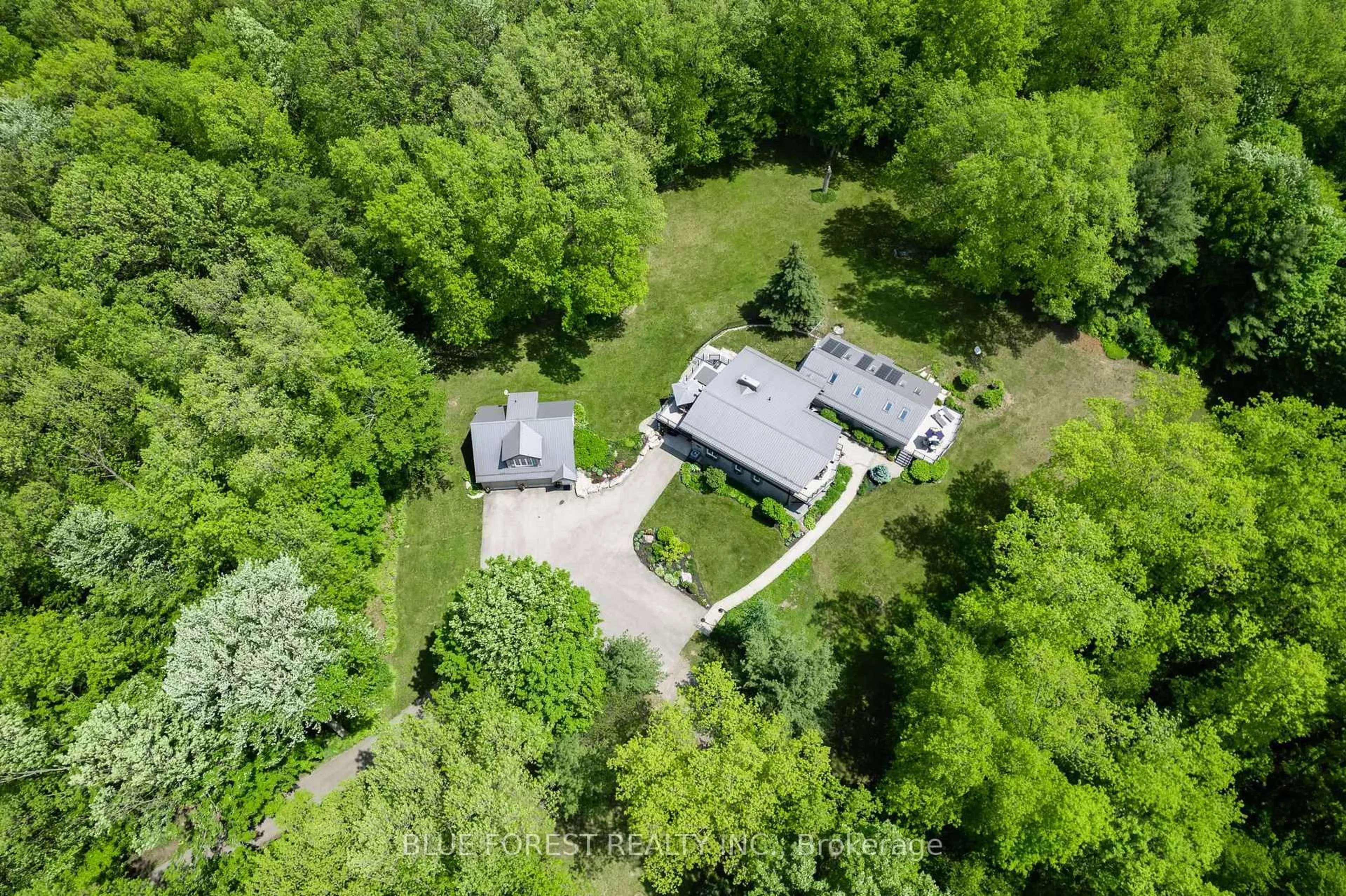 A pic from outside/outdoor area/front of a property/back of a property/a pic from drone, forest/trees view for 5721 Marion St, Thames Centre Ontario N0L 1G4
