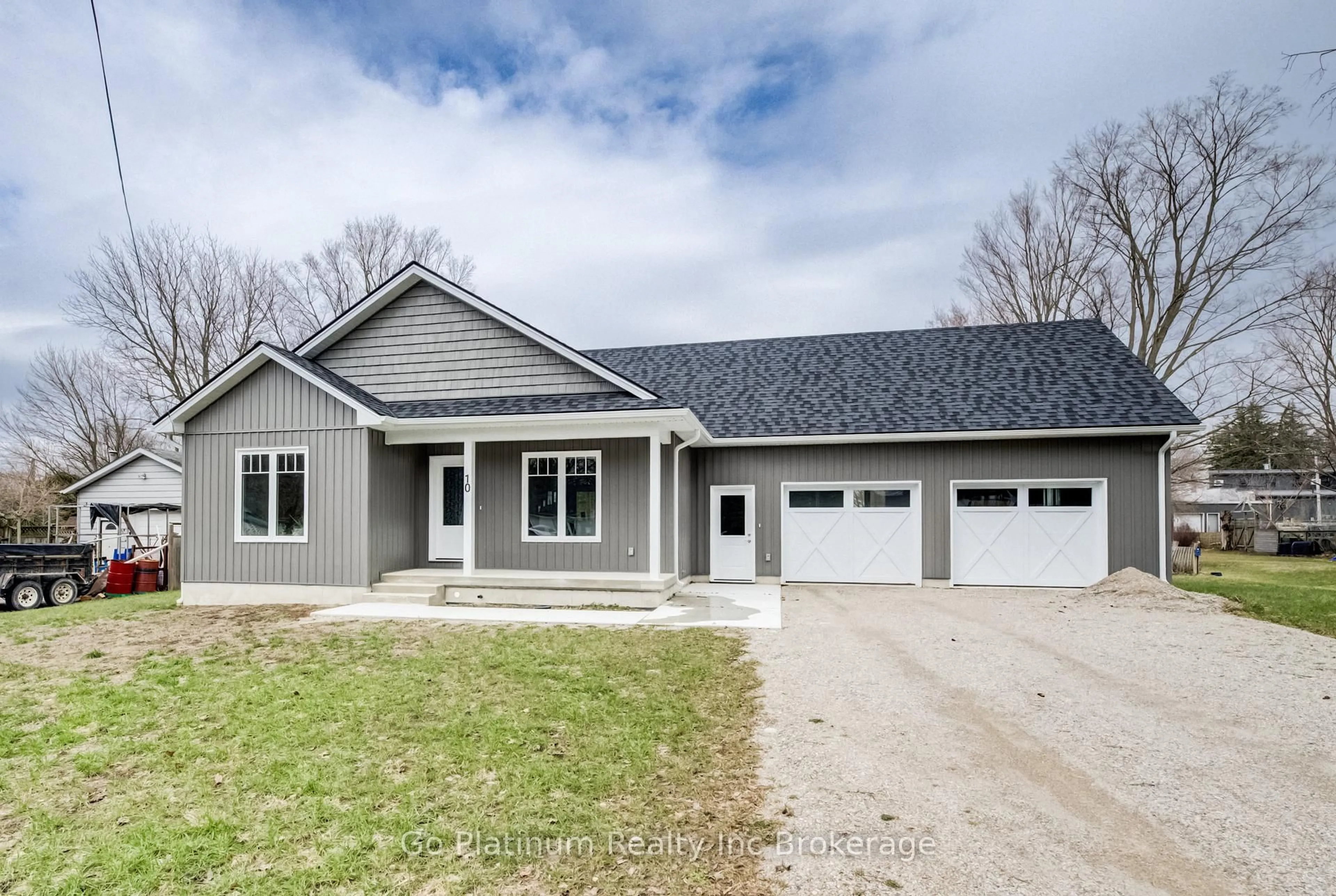 Home with vinyl exterior material, street for 10 Mill St, Norwich Ontario N0J 1R0