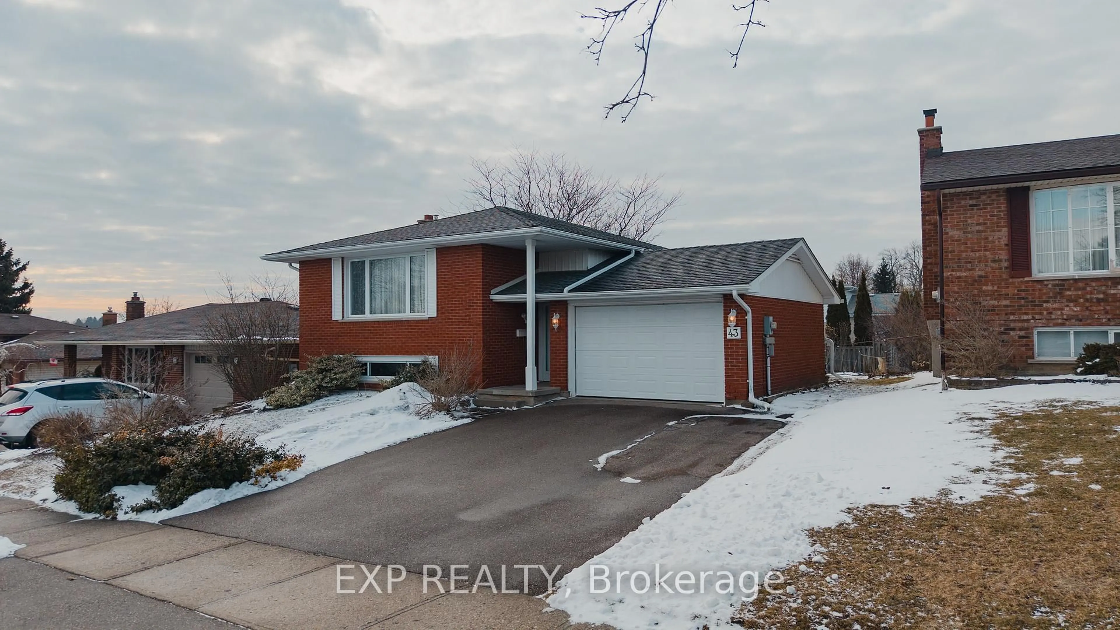 Home with brick exterior material, street for 43 Ripley Cres, Kitchener Ontario N2N 1W2