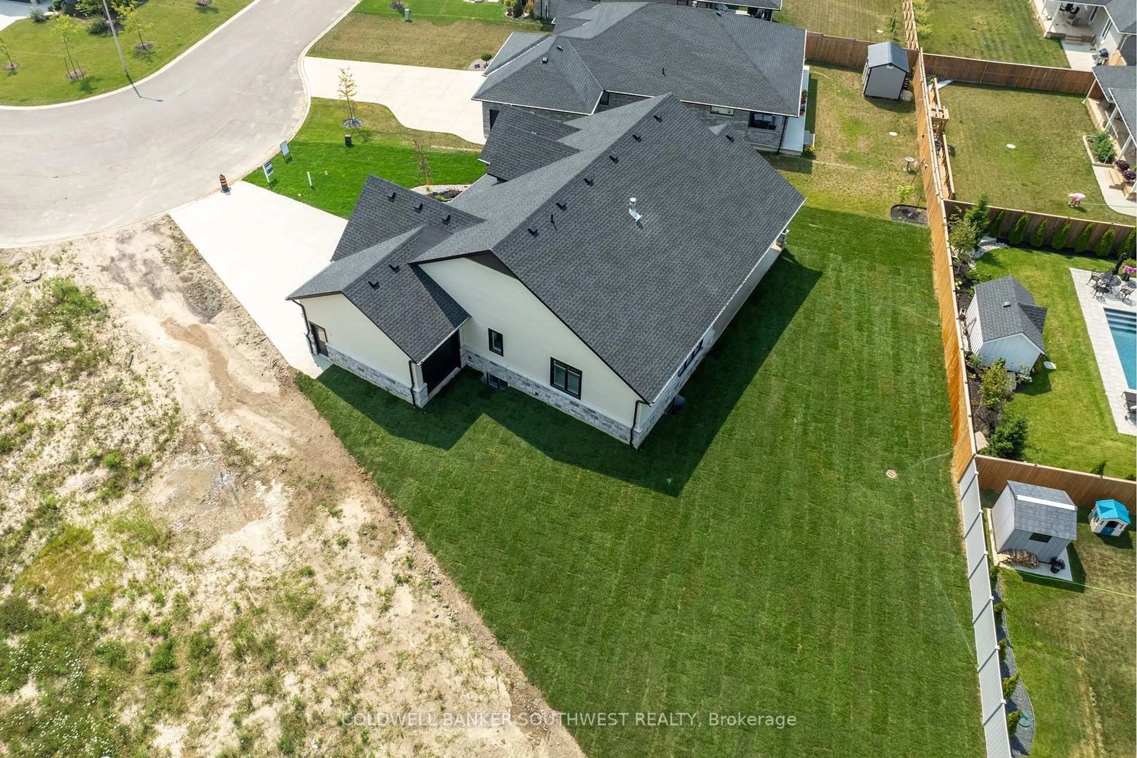 A pic from outside/outdoor area/front of a property/back of a property/a pic from drone, street for 6755 Griffin Dr, Plympton-Wyoming Ontario N0N 1E0