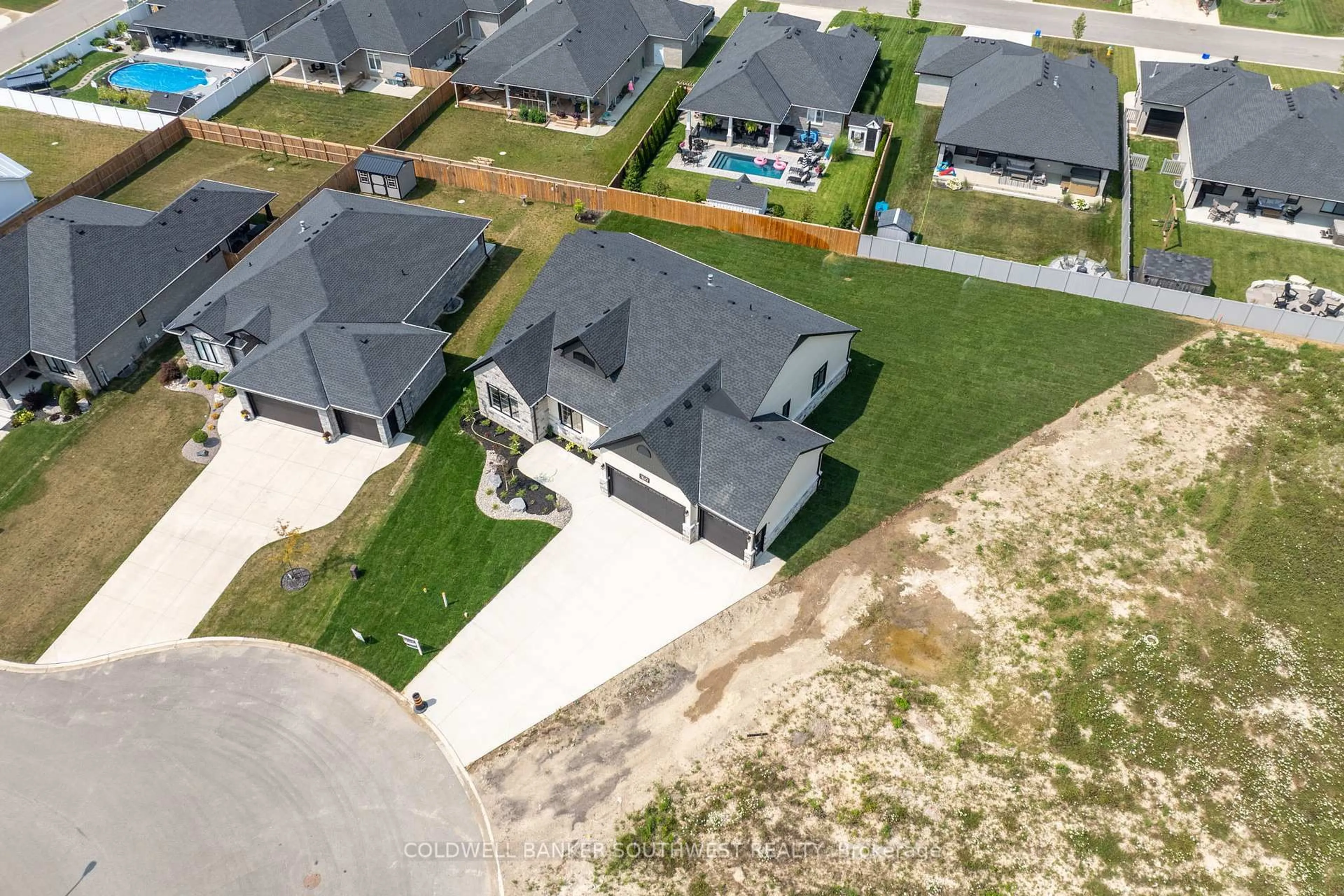A pic from outside/outdoor area/front of a property/back of a property/a pic from drone, street for 6755 Griffin Dr, Plympton-Wyoming Ontario N0N 1E0