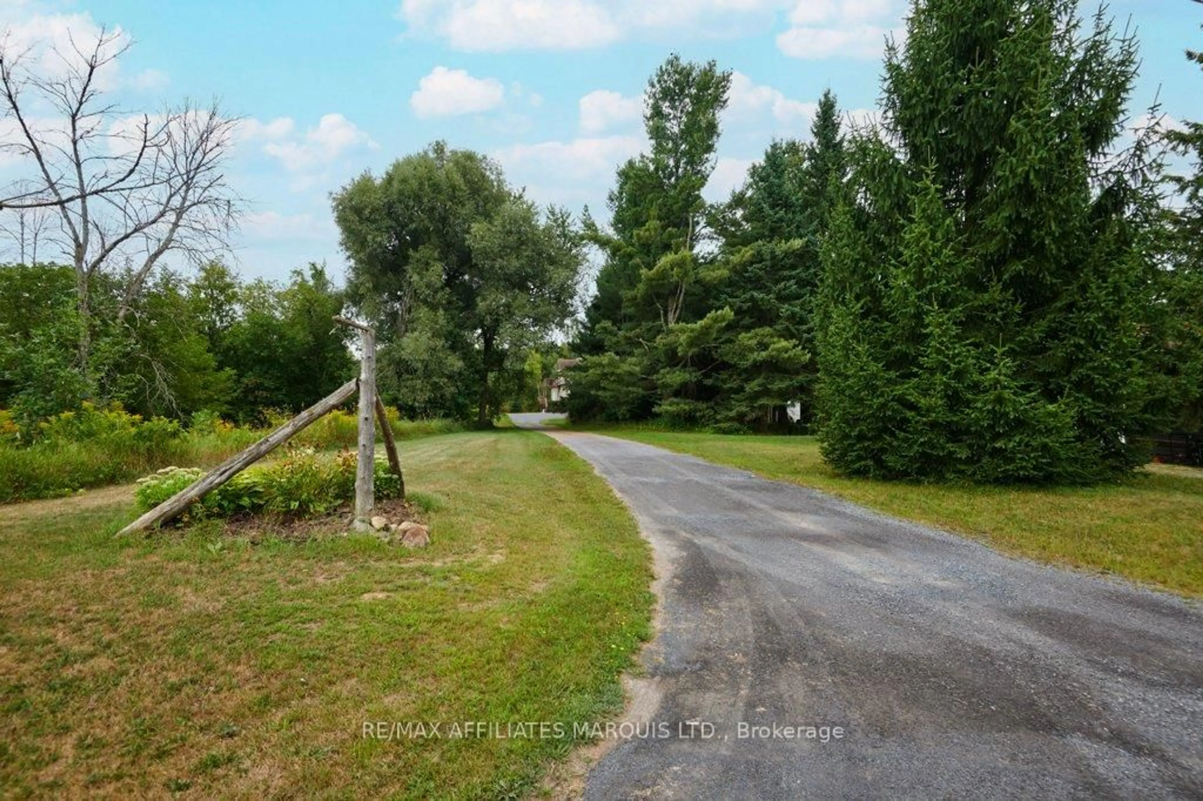 A pic from outside/outdoor area/front of a property/back of a property/a pic from drone, forest/trees view for 35 Nevada St, North Stormont Ontario K0C 1W0
