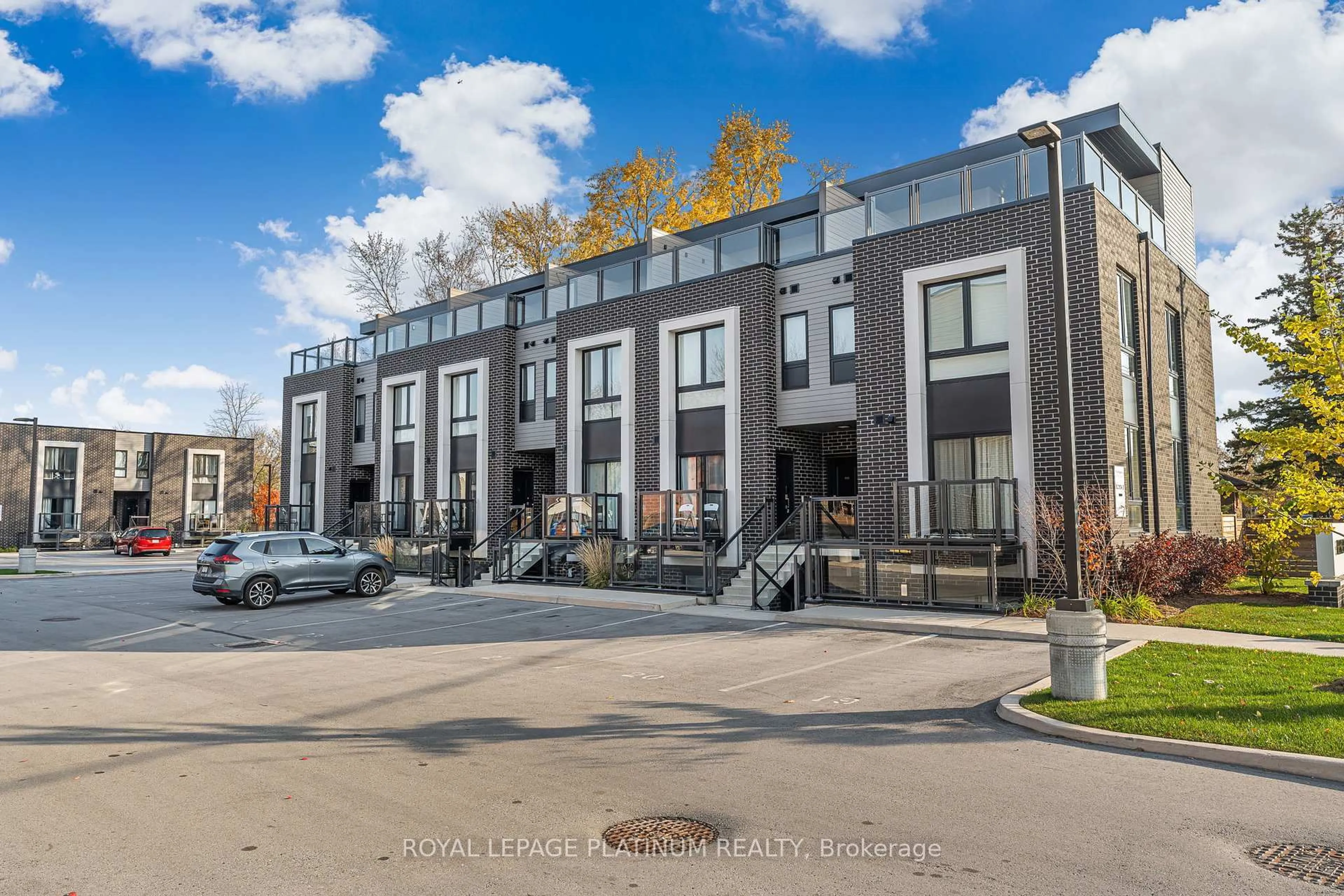 Patio, street for 6065 MCLEOD Rd #213, Niagara Falls Ontario L2G 0Z7